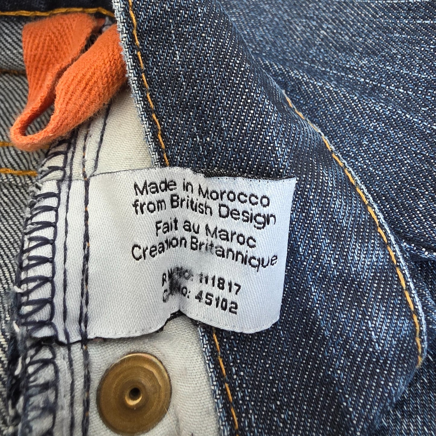 Superdry blue straight jeans with button fly, vintage raw denim, light wear.