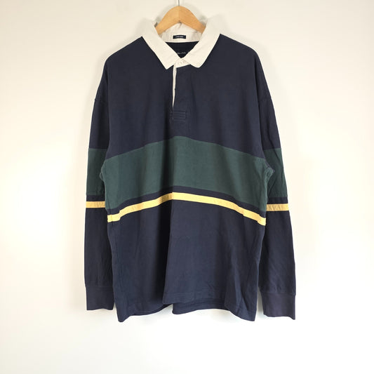 Abercrombie & Fitch blue rugby shirt with green stripes, cream collar, oversized fit.