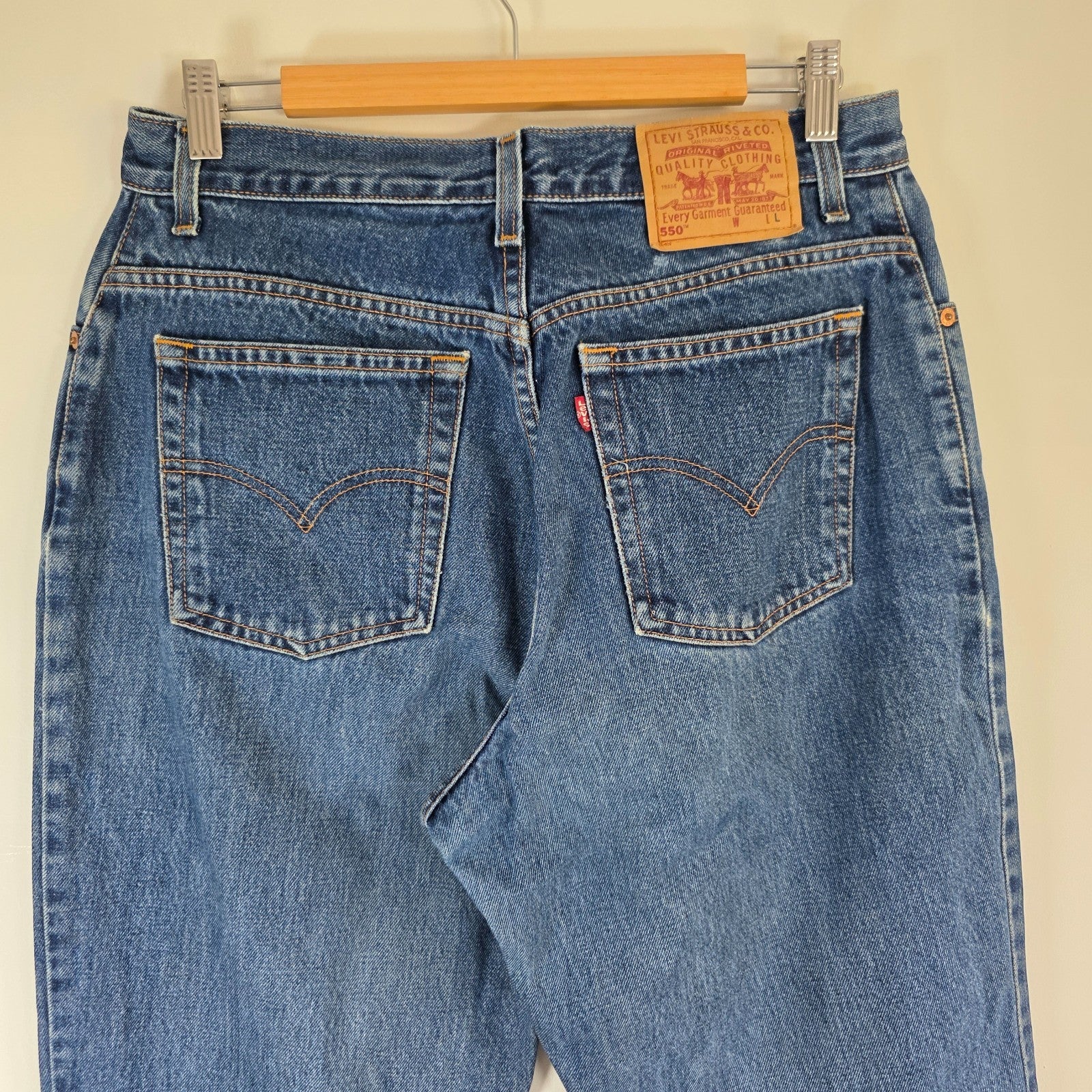 Vintage Levi's 550 Relaxed Fit Jeans Womens W31 L32 Blue Tapered Leg Distressed