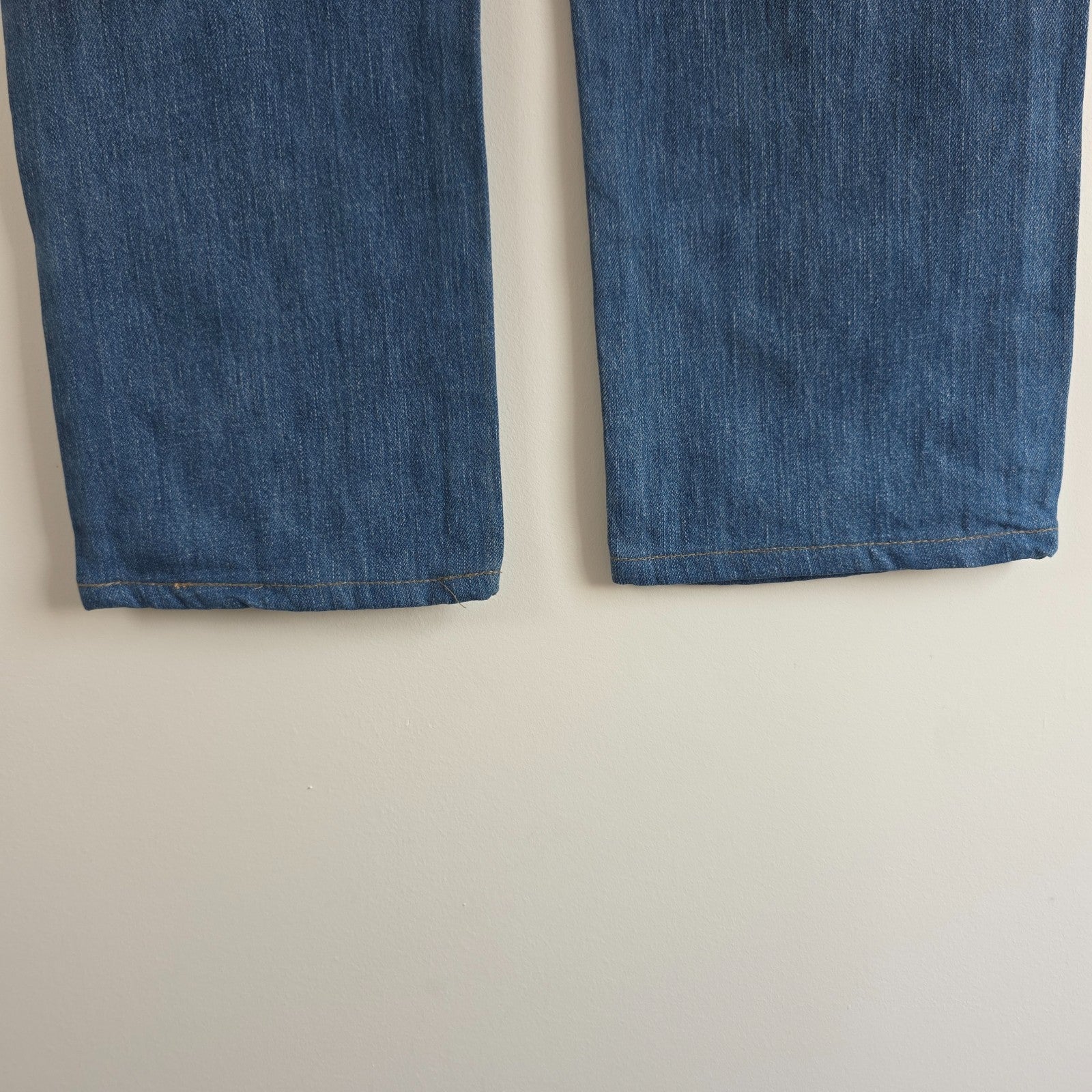 Calvin Klein blue straight jeans 100% cotton with relaxed fit and subtle logo detail.