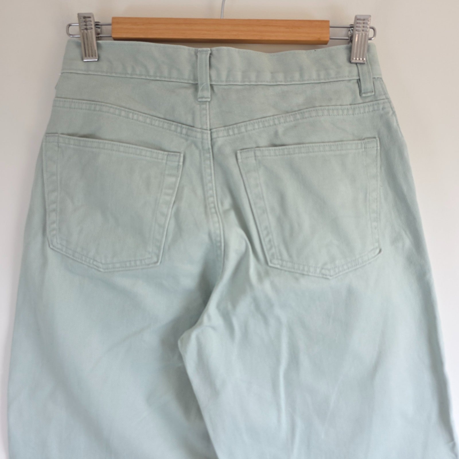 Gap pale mint green straight leg jeans with high rise and 100% cotton material.