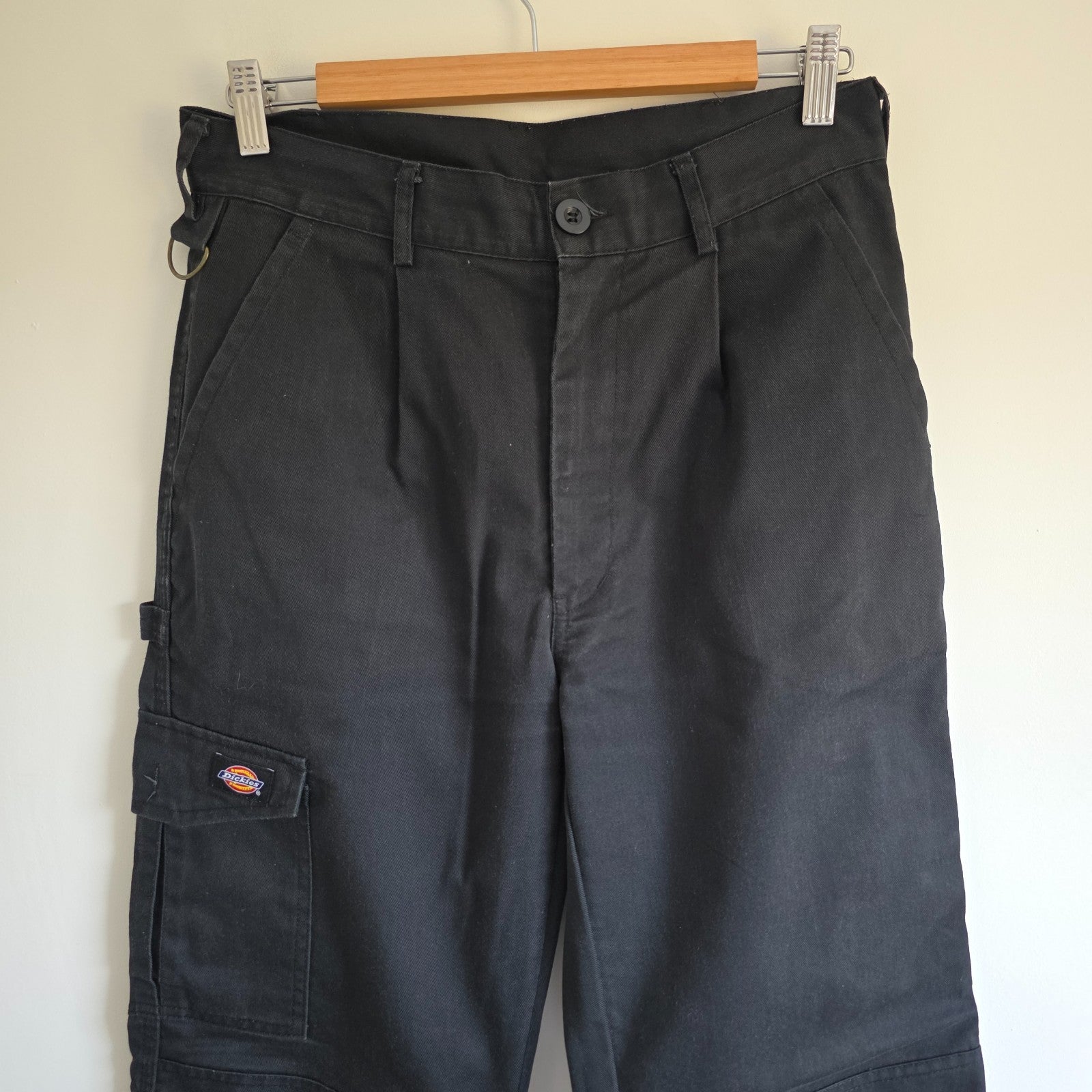 Dickies black cargo trousers with double knee panels and hammer loop detail.