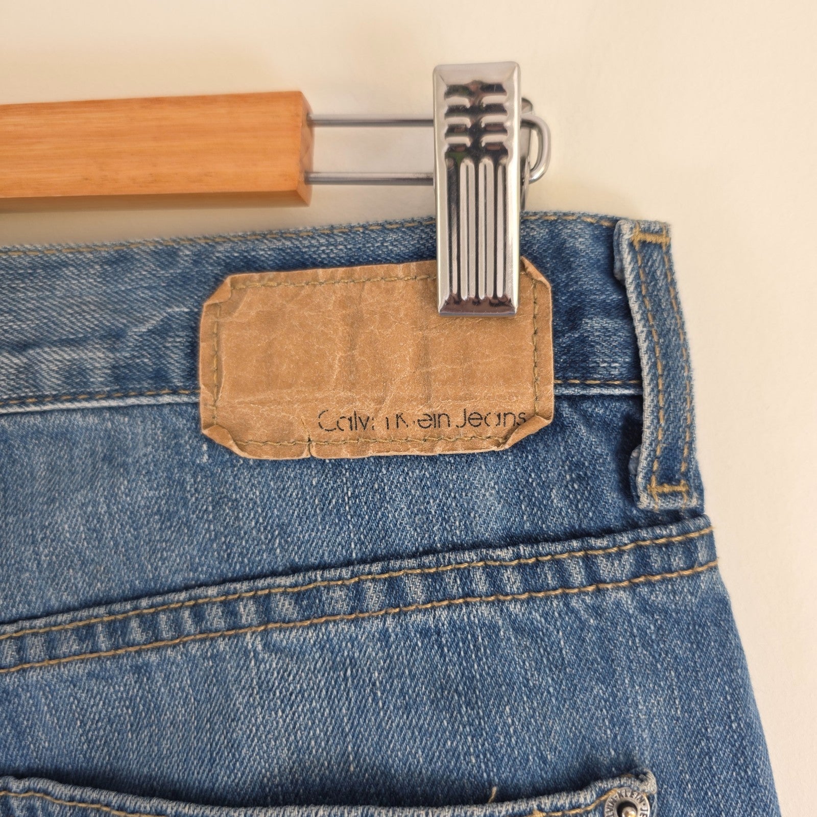 Calvin Klein blue straight jeans 100% cotton with relaxed fit and subtle logo detail.