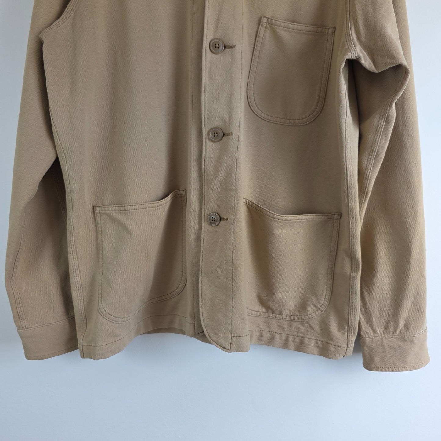 Uniqlo beige chore jacket cotton blend with stretch, classic workwear design.