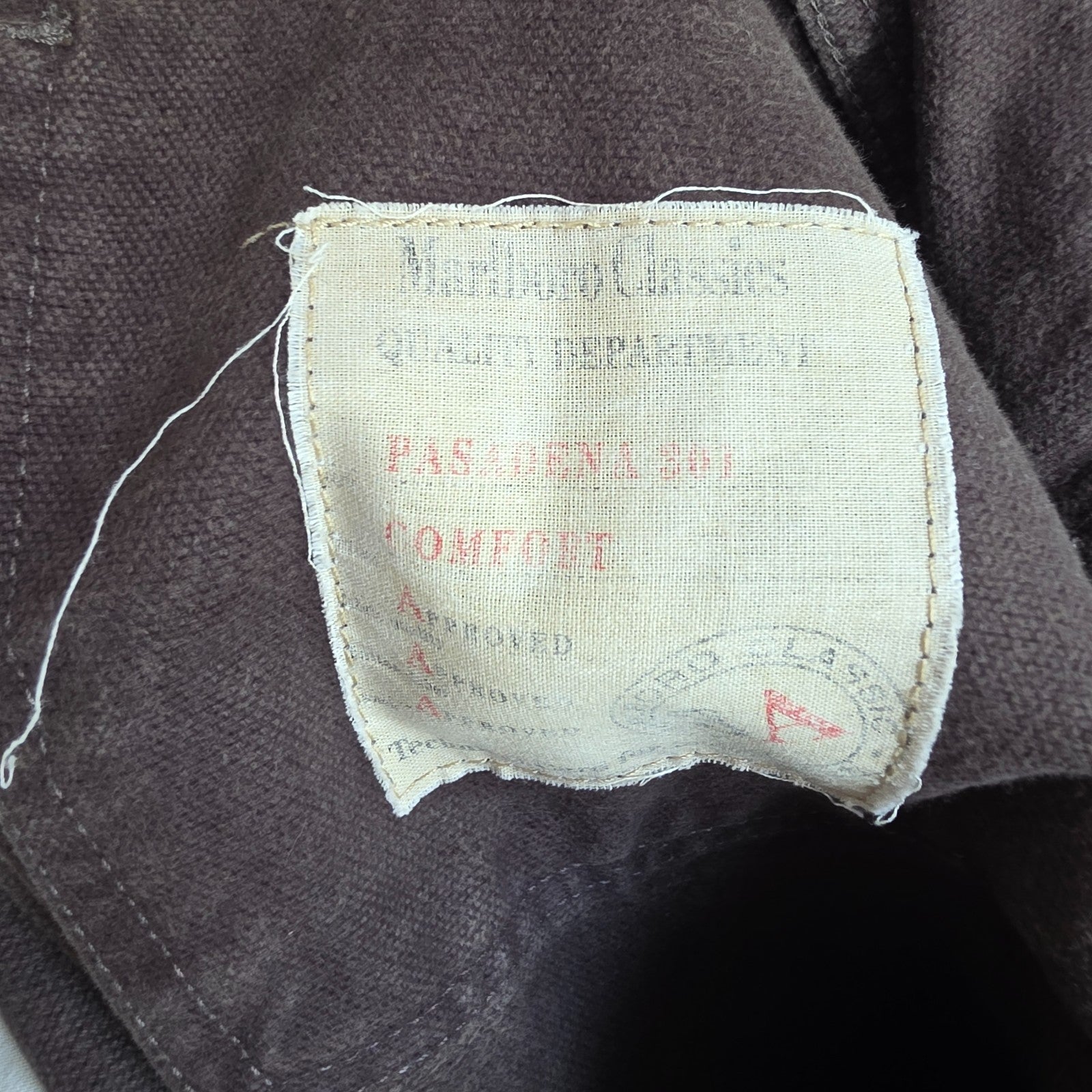 Marlboro Classics grey straight jeans with button fly and vintage logo detail.