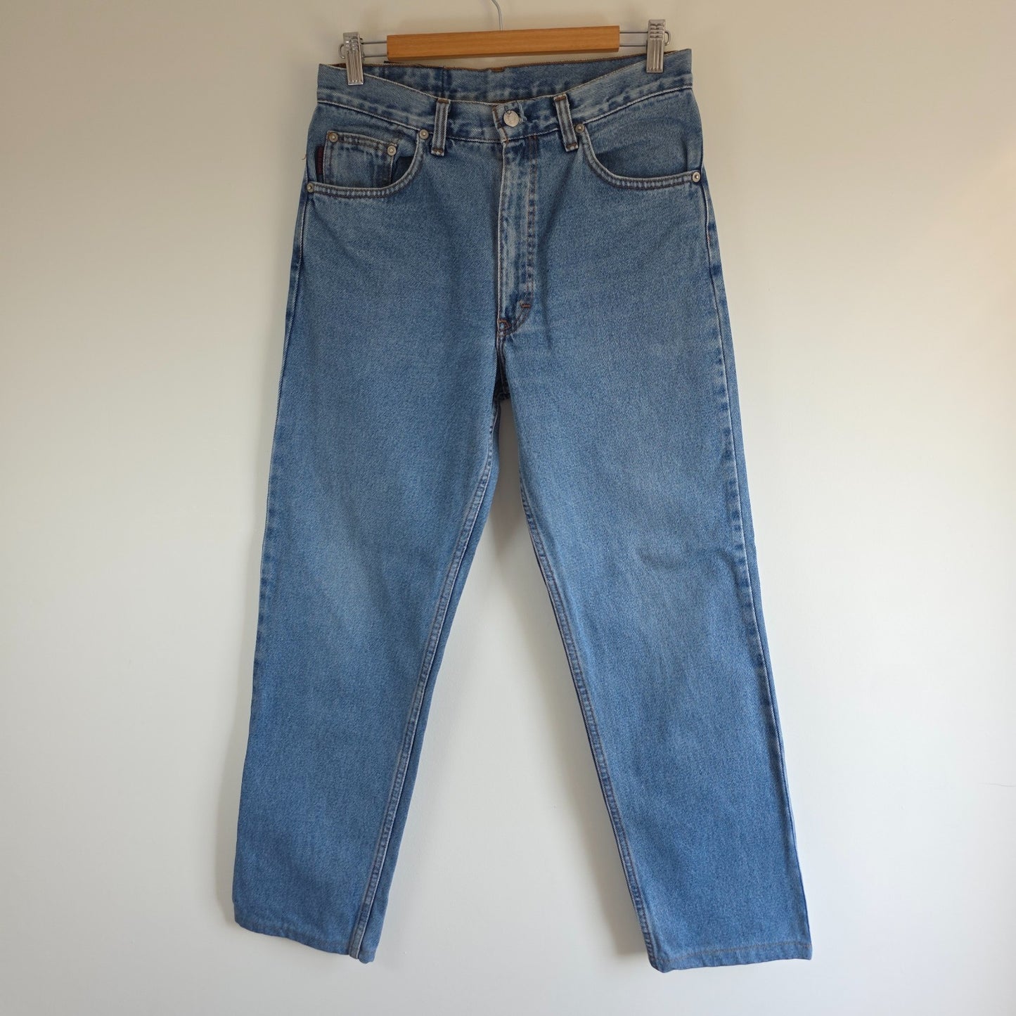 Robe Di Kappa blue straight jeans with vintage wash and subtle logo detail.