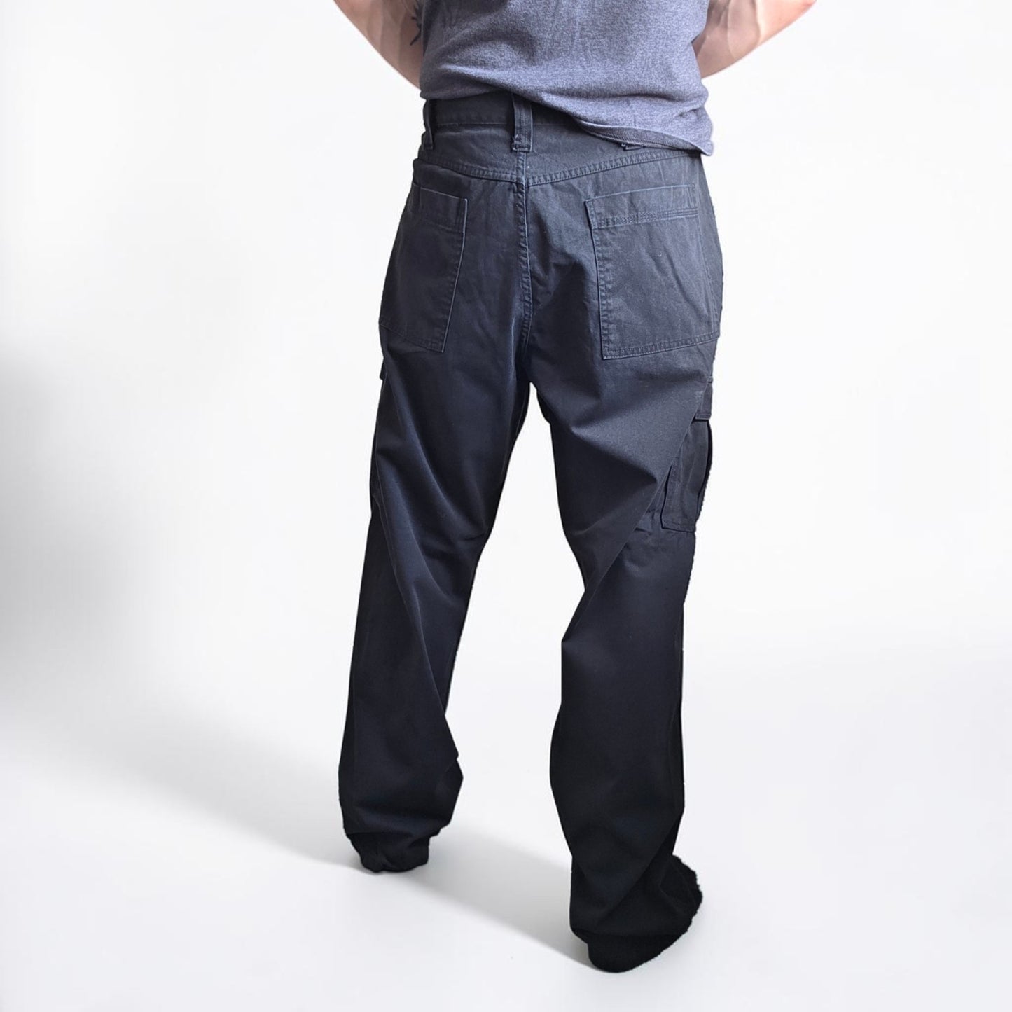 Wrangler black cargo trousers relaxed fit with utility pockets and durable cotton material.