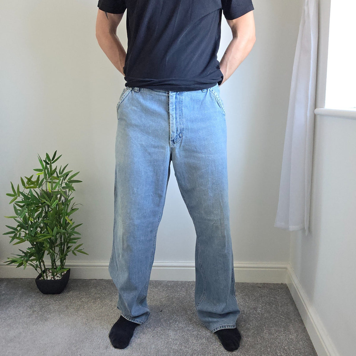 Old Navy blue carpenter jeans with hammer loop and utility pockets, 100% cotton.