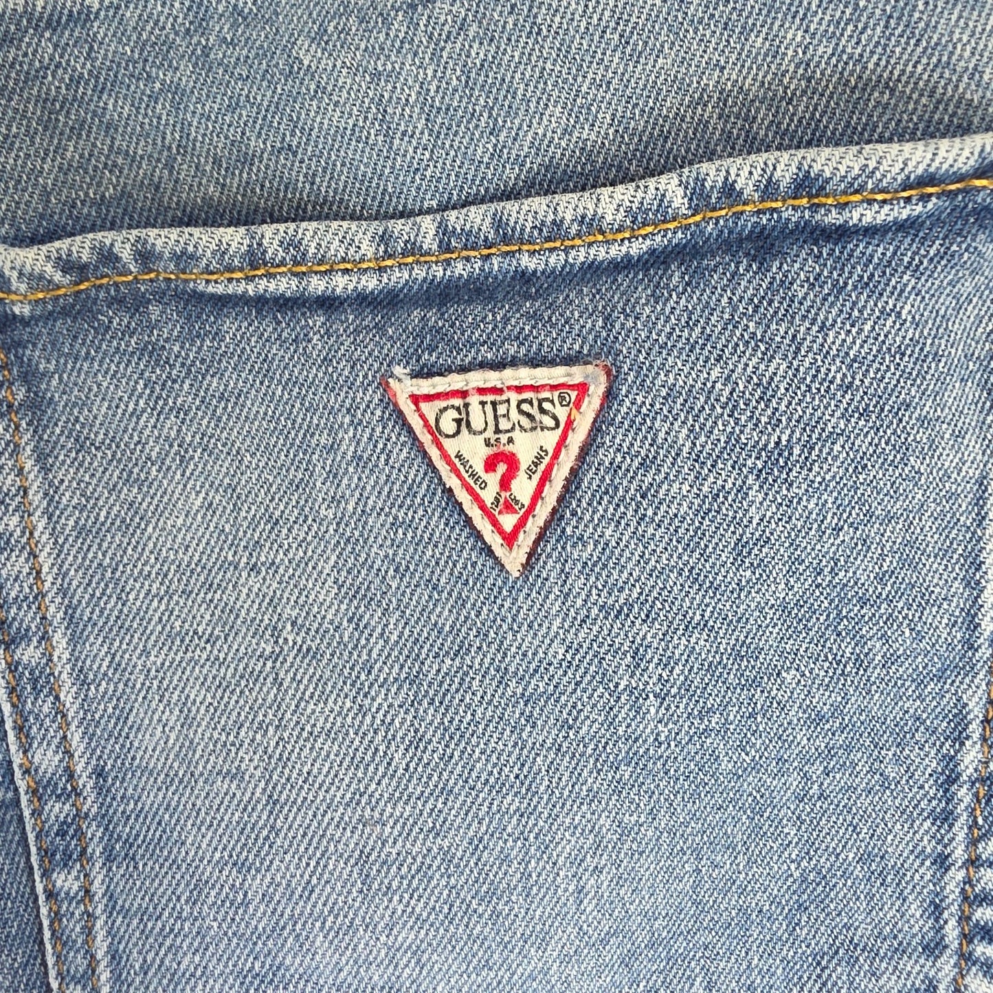 Vintage Guess blue cropped straight jeans with distressed details and high rise fit.
