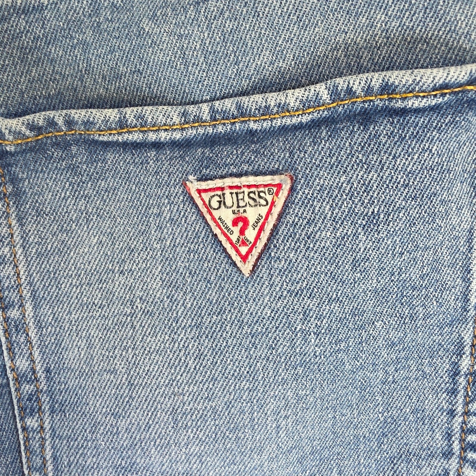 Vintage Guess blue cropped straight jeans with distressed details and high rise fit.