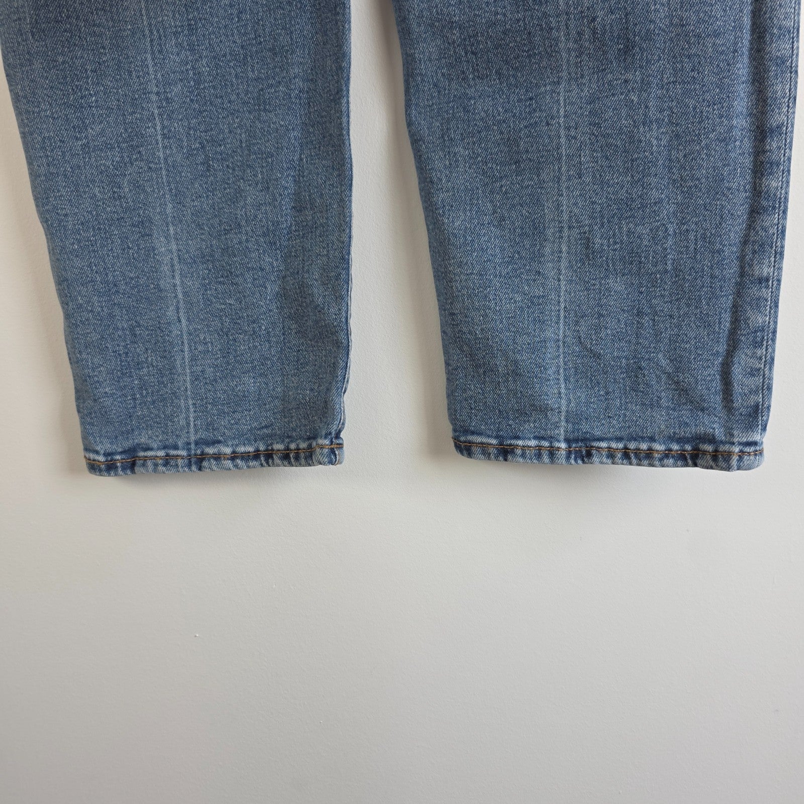 Vintage Guess blue cropped straight jeans with distressed details and high rise fit.