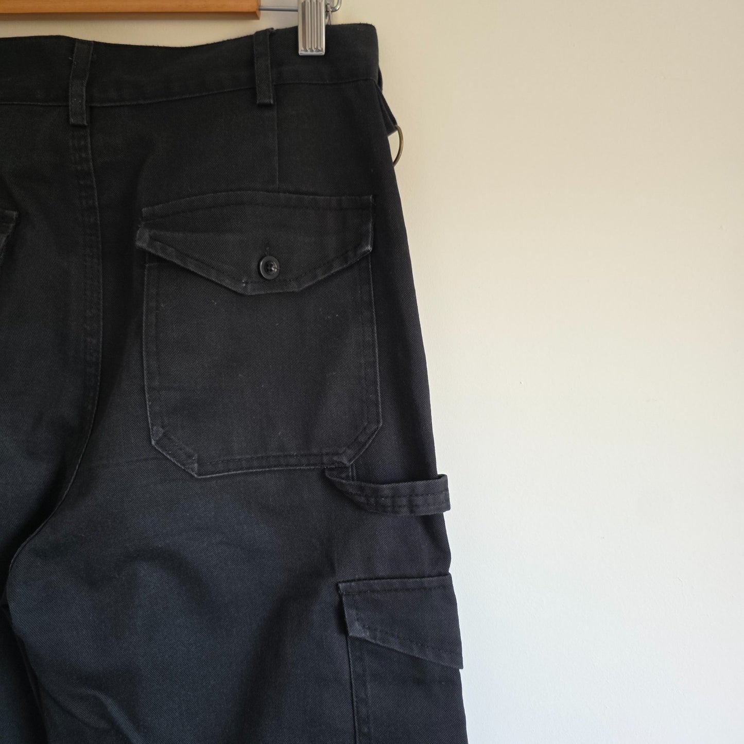 Dickies black cargo trousers with double knee panels and hammer loop detail.