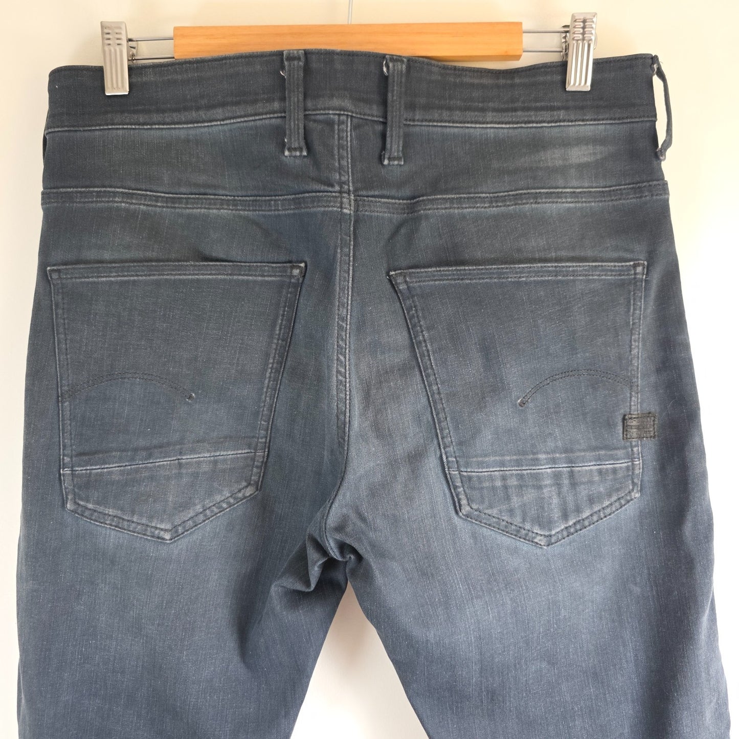 G-Star blue stretch denim slim jeans with biker detailing and logo patch.