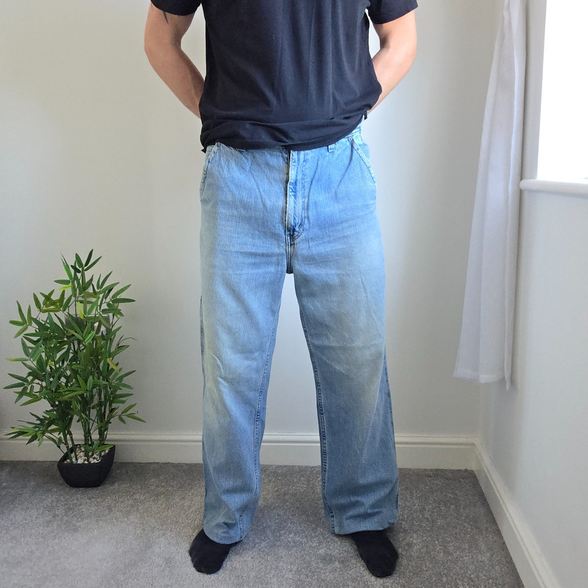 Urban Up blue carpenter jeans with hammer loop and utility pocket detailing.