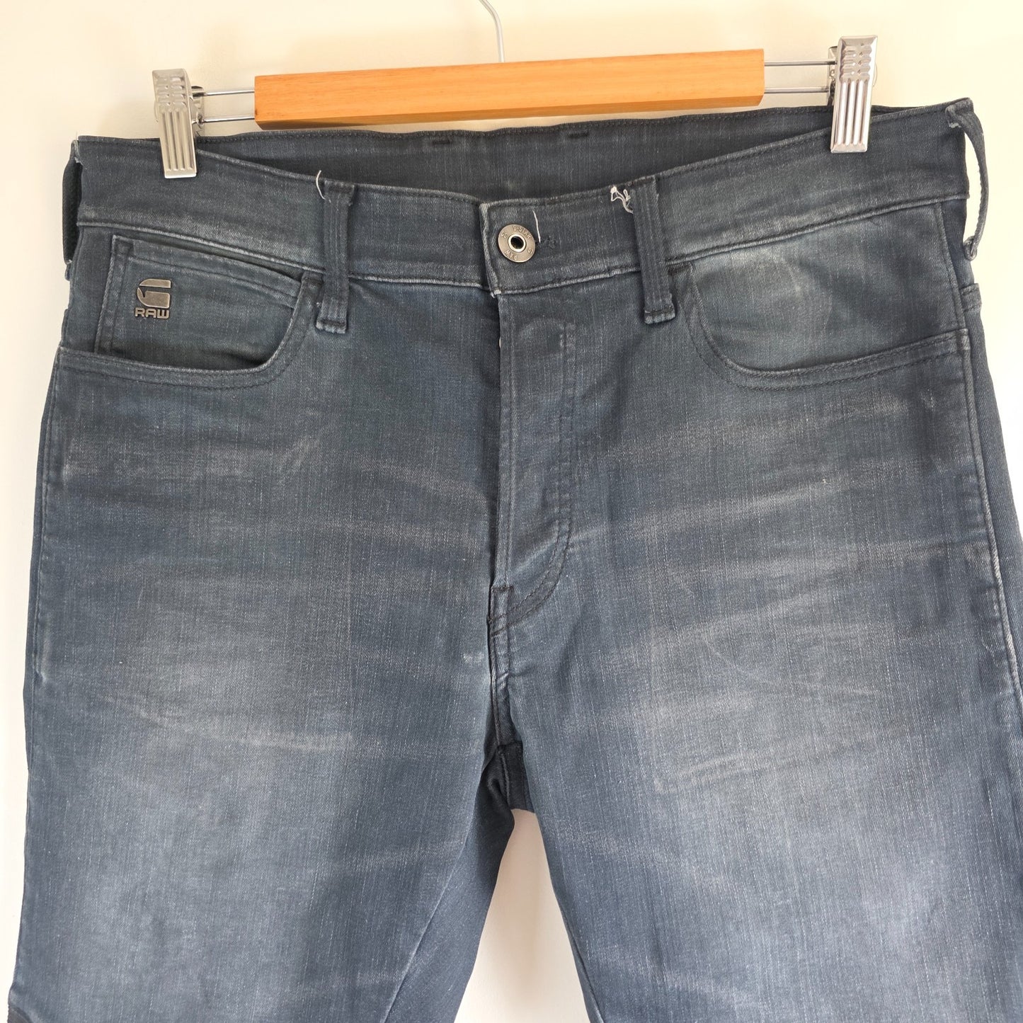 G-Star blue stretch denim slim jeans with biker detailing and logo patch.