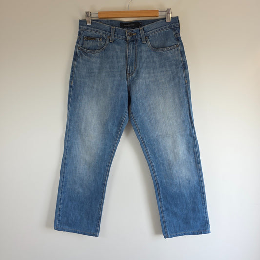 Calvin Klein blue straight jeans 100% cotton with relaxed fit and subtle logo detail.