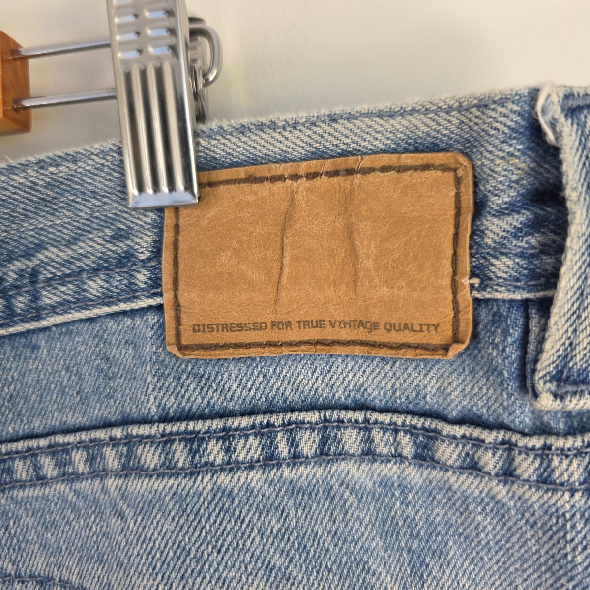 Urban Up blue carpenter jeans with hammer loop and utility pocket detailing.