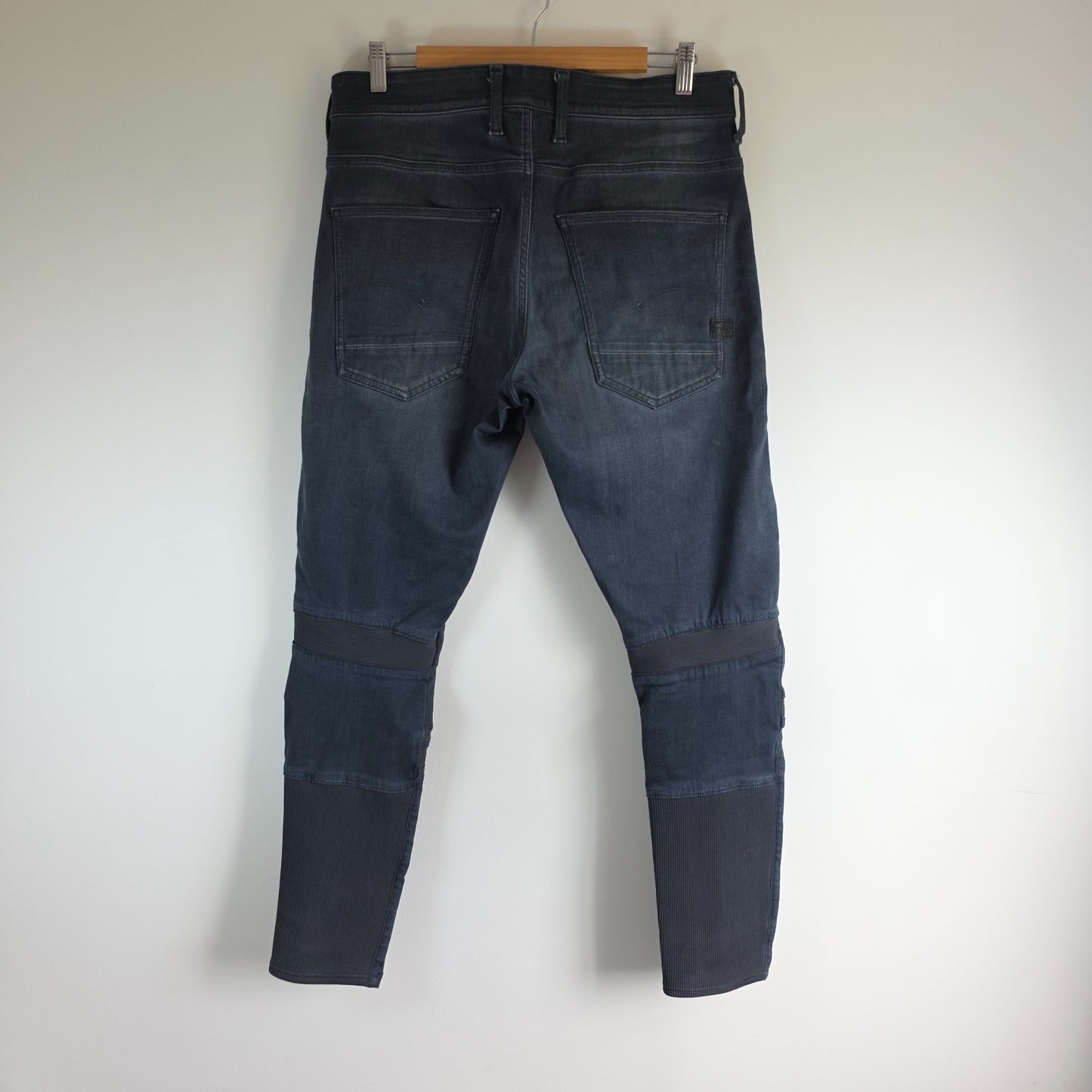 G-Star blue stretch denim slim jeans with biker detailing and logo patch.