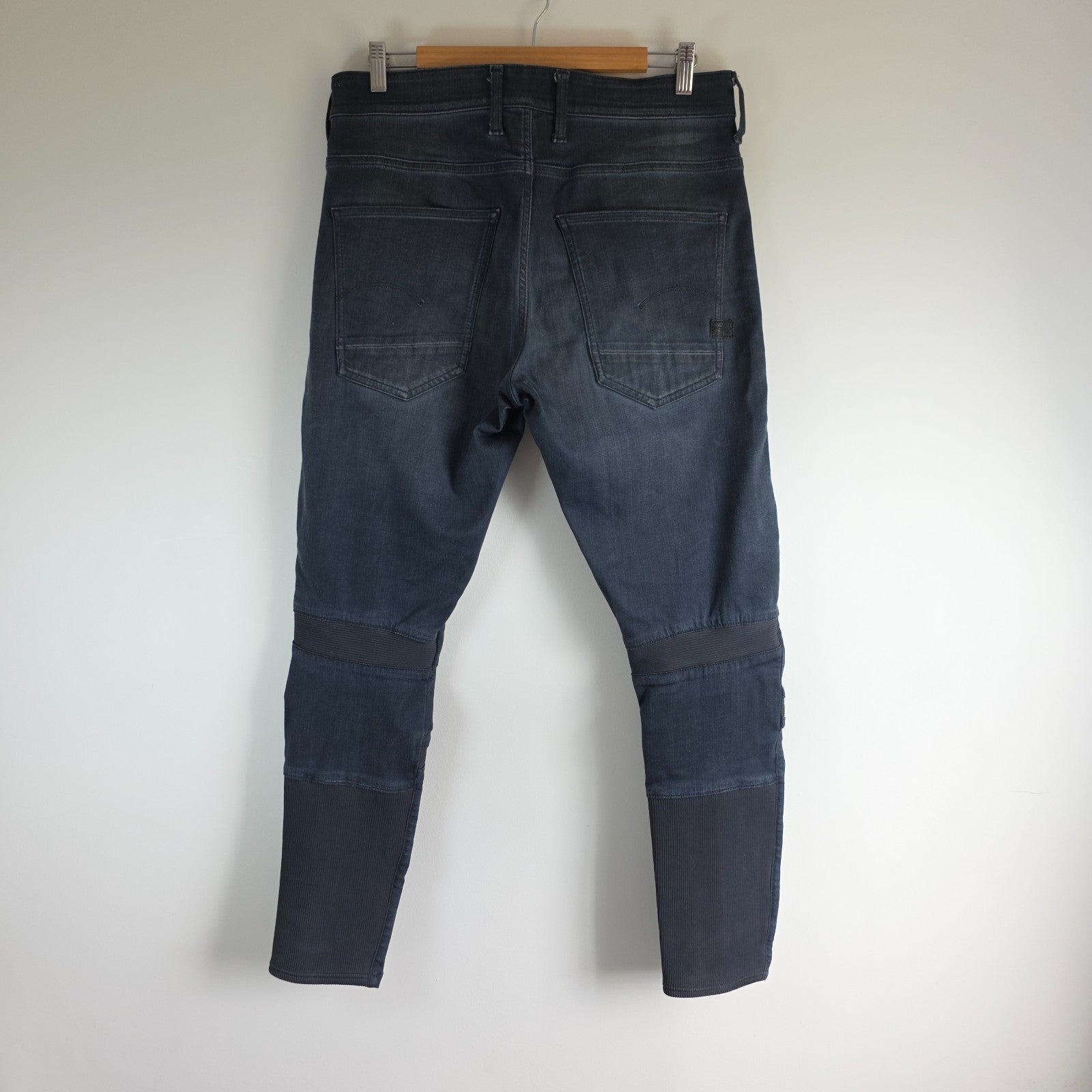 G-Star blue stretch denim slim jeans with biker detailing and logo patch.