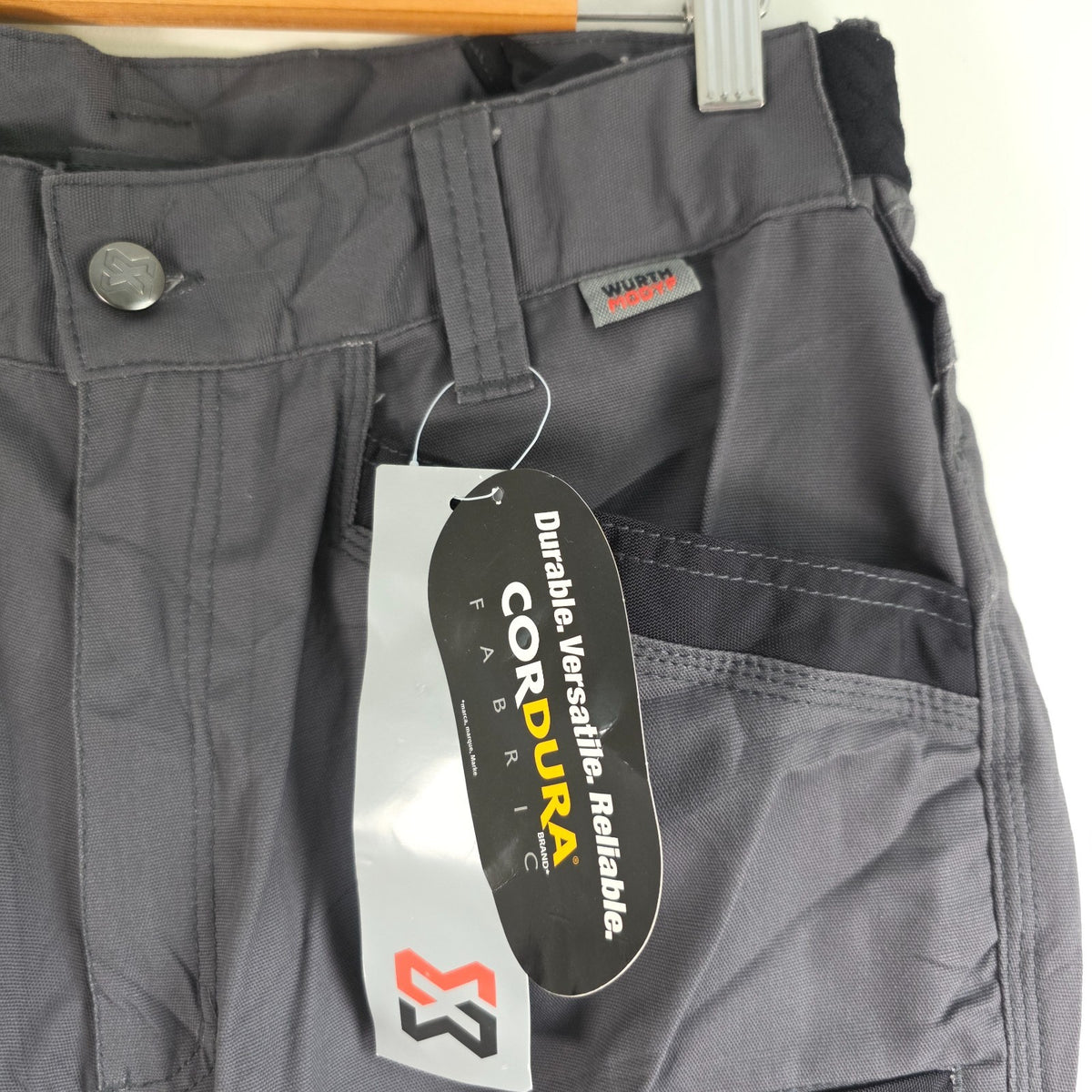 Würth Modyf black cargo trousers with reinforced knees and multiple utility pockets.