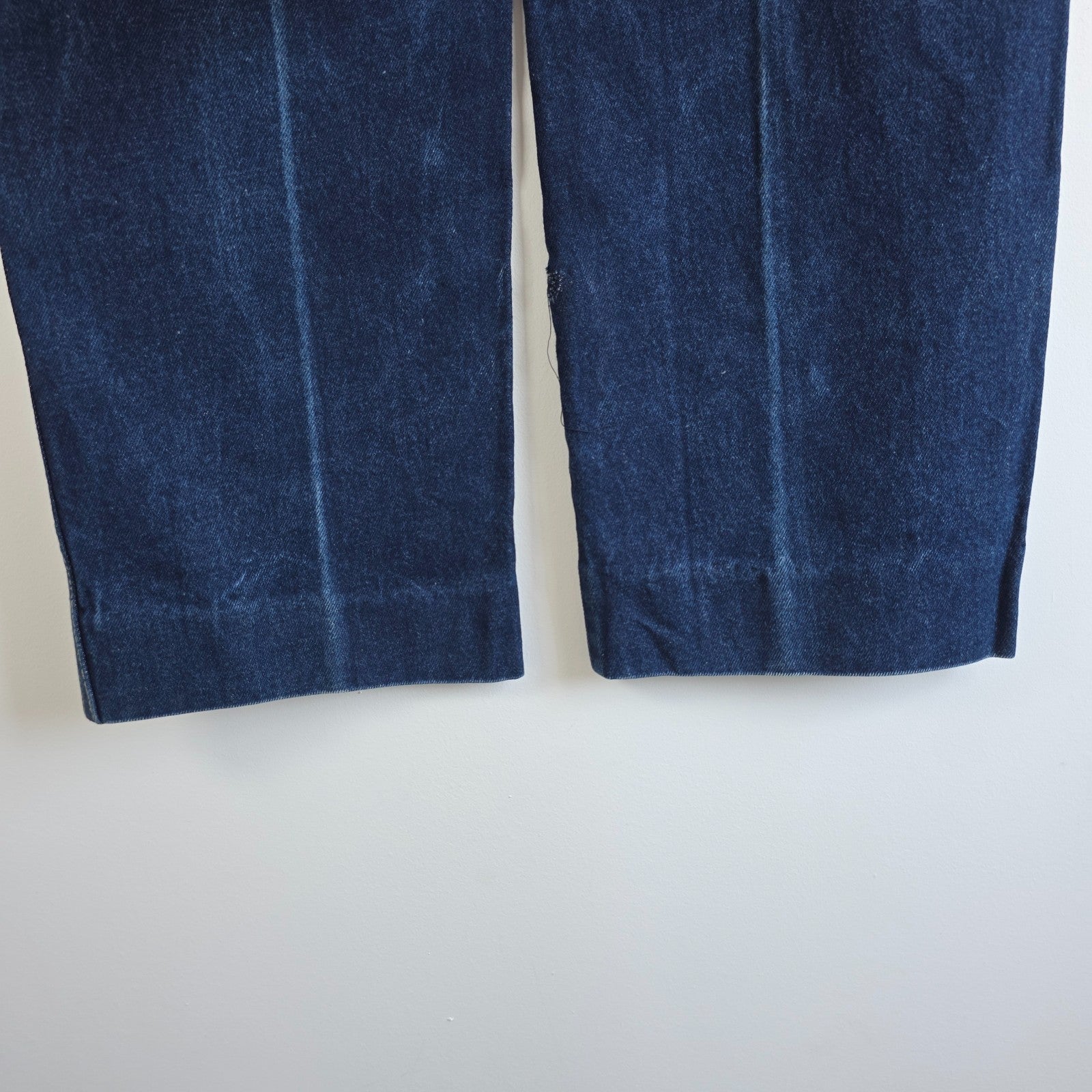 Calvin Klein blue straight leg jeans with vintage 90s style and cotton material.