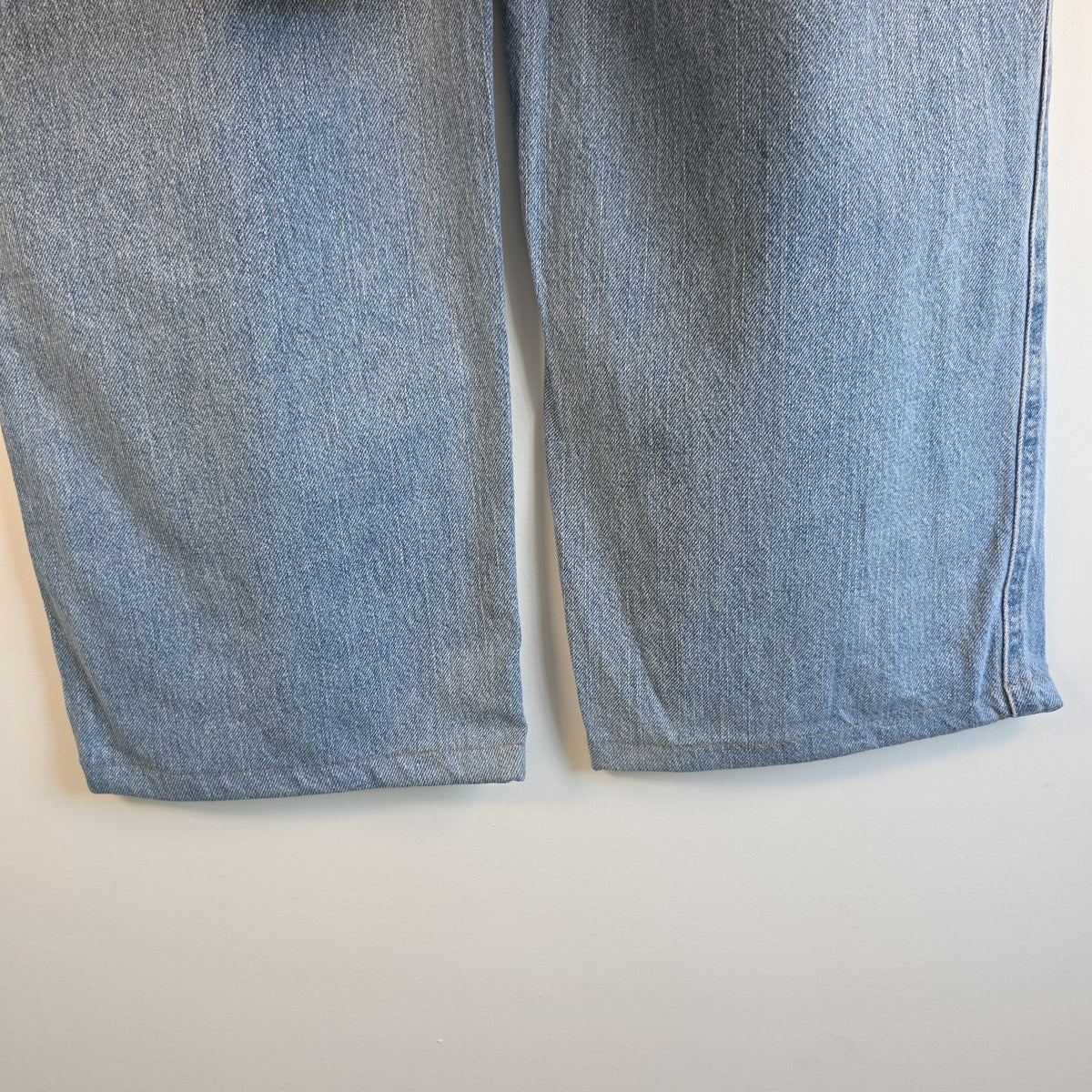 Urban Up blue carpenter jeans with hammer loop and utility pocket detailing.
