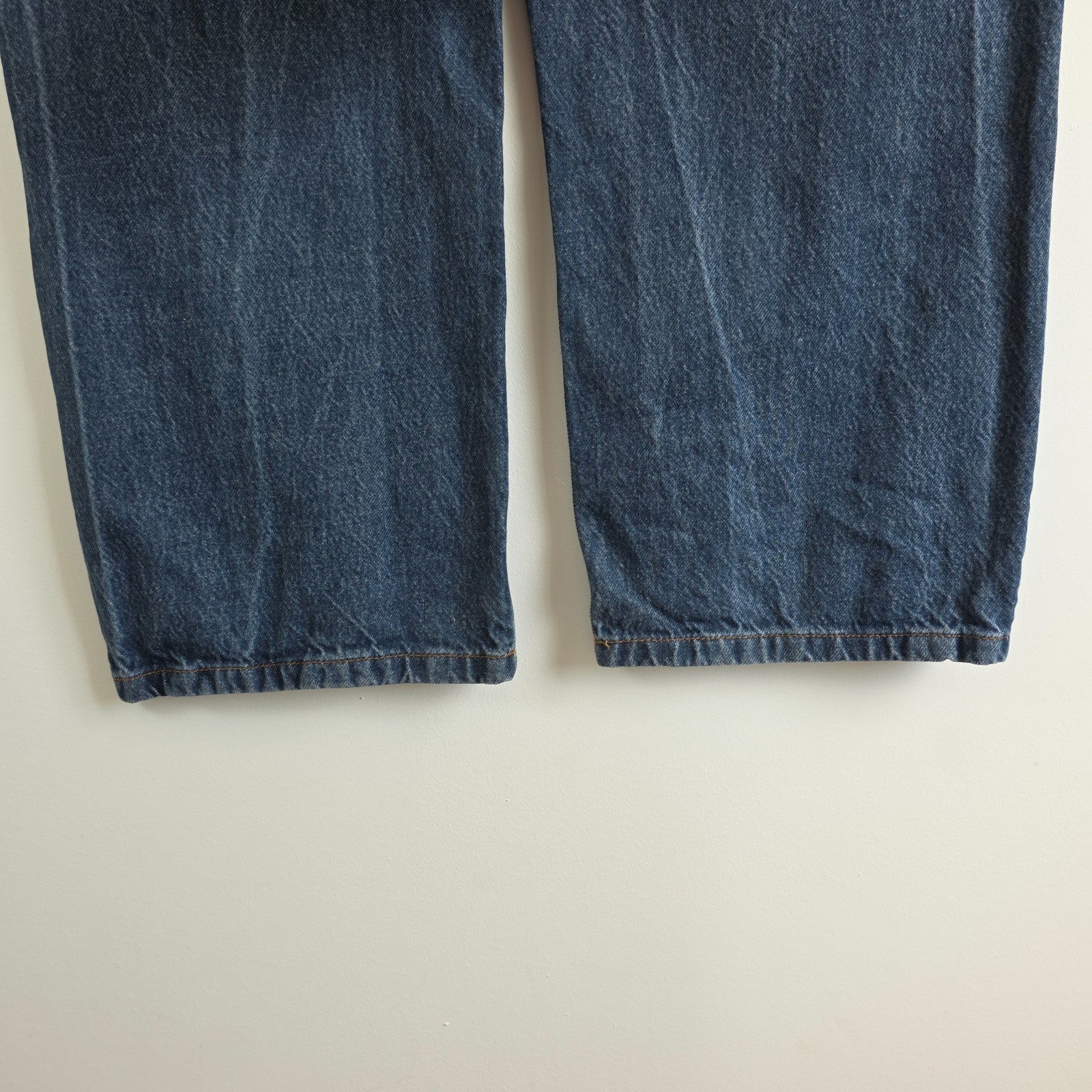 Wrangler blue baggy carpenter jeans with embroidered back pocket design and carpenter pocket detailing.