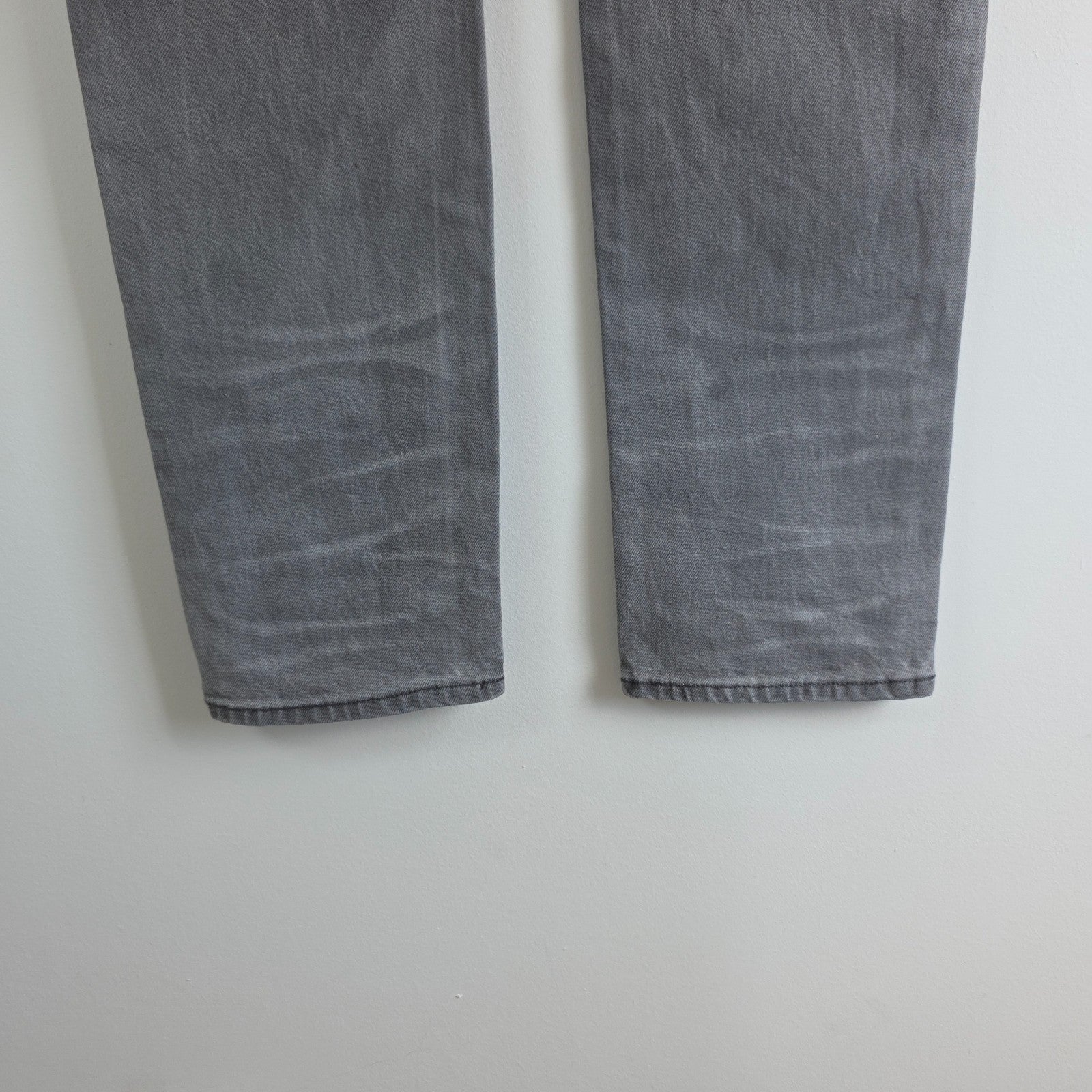 AllSaints grey slim jeans with button fly and stretch cotton elastane blend.