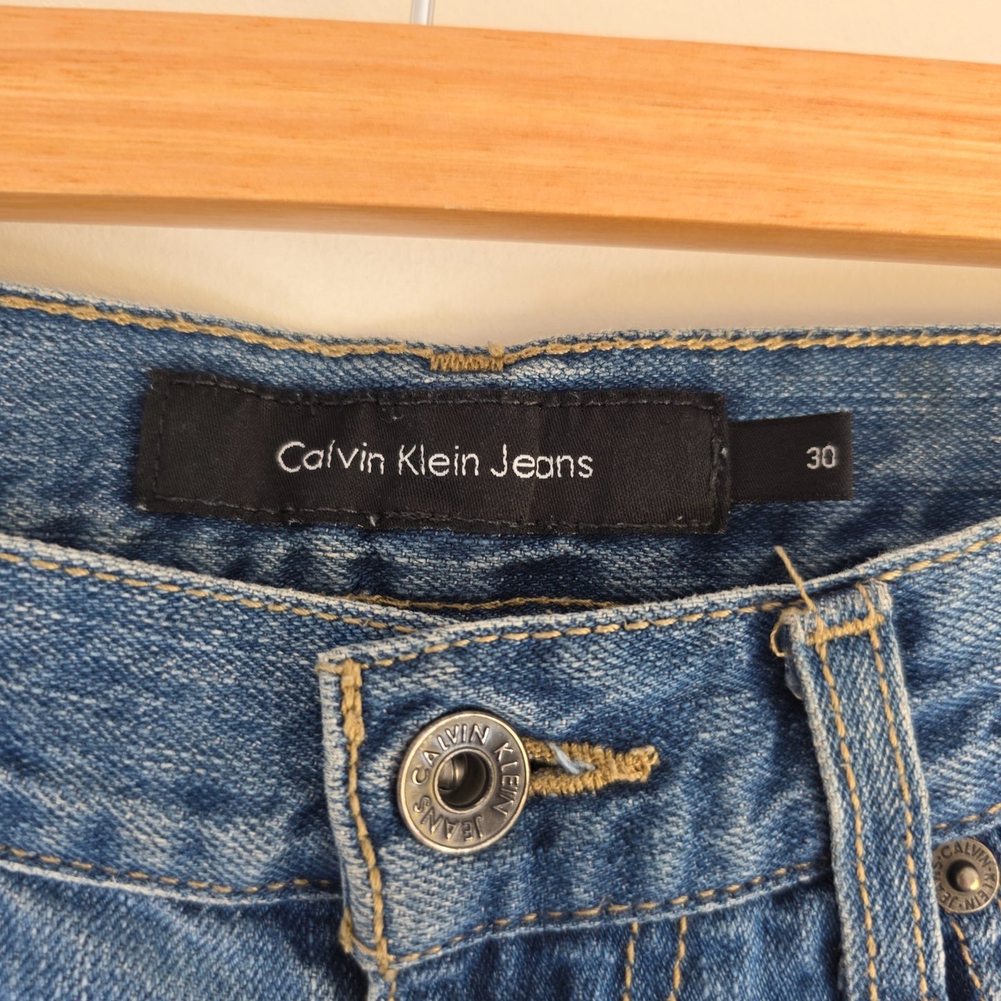 Calvin Klein blue straight jeans 100% cotton with relaxed fit and subtle logo detail.
