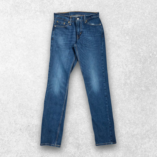 Levi's blue straight jeans with distressed patches and natural wear, made in USA.