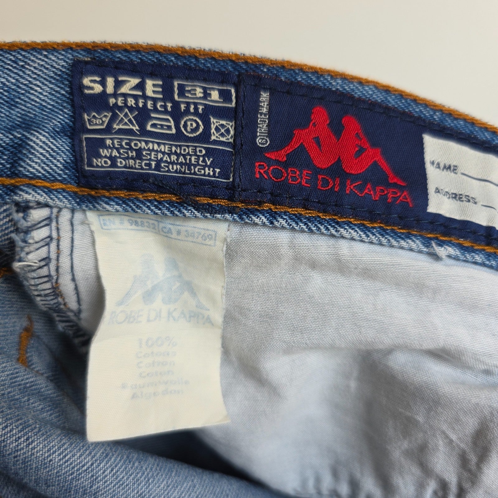 Robe Di Kappa blue straight jeans with vintage wash and subtle logo detail.