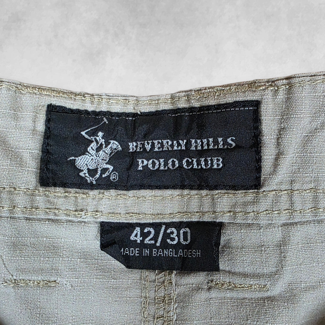 Polo Ralph Lauren beige cargo trousers with multiple pockets and straight leg cut.