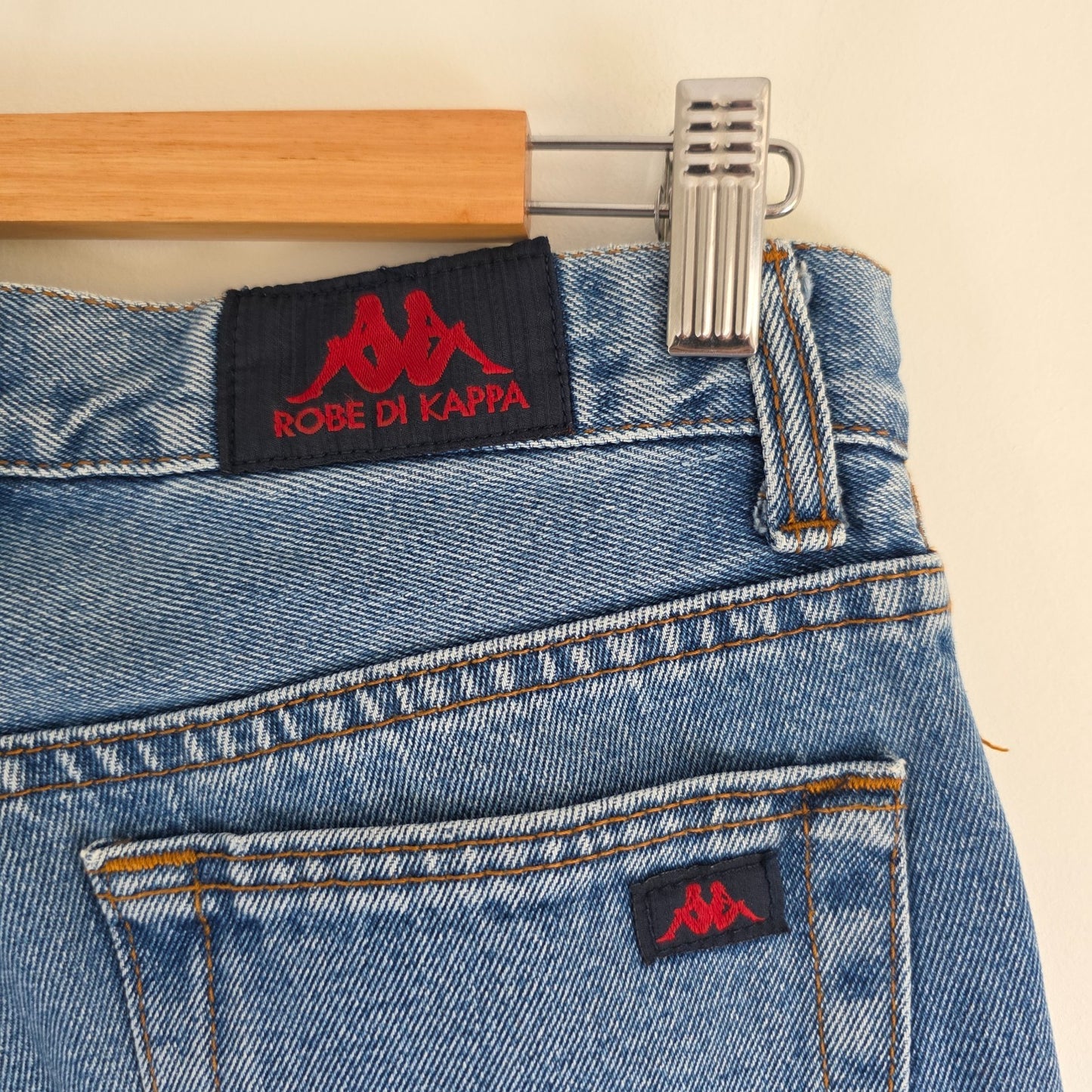 Robe Di Kappa blue straight jeans with vintage wash and subtle logo detail.