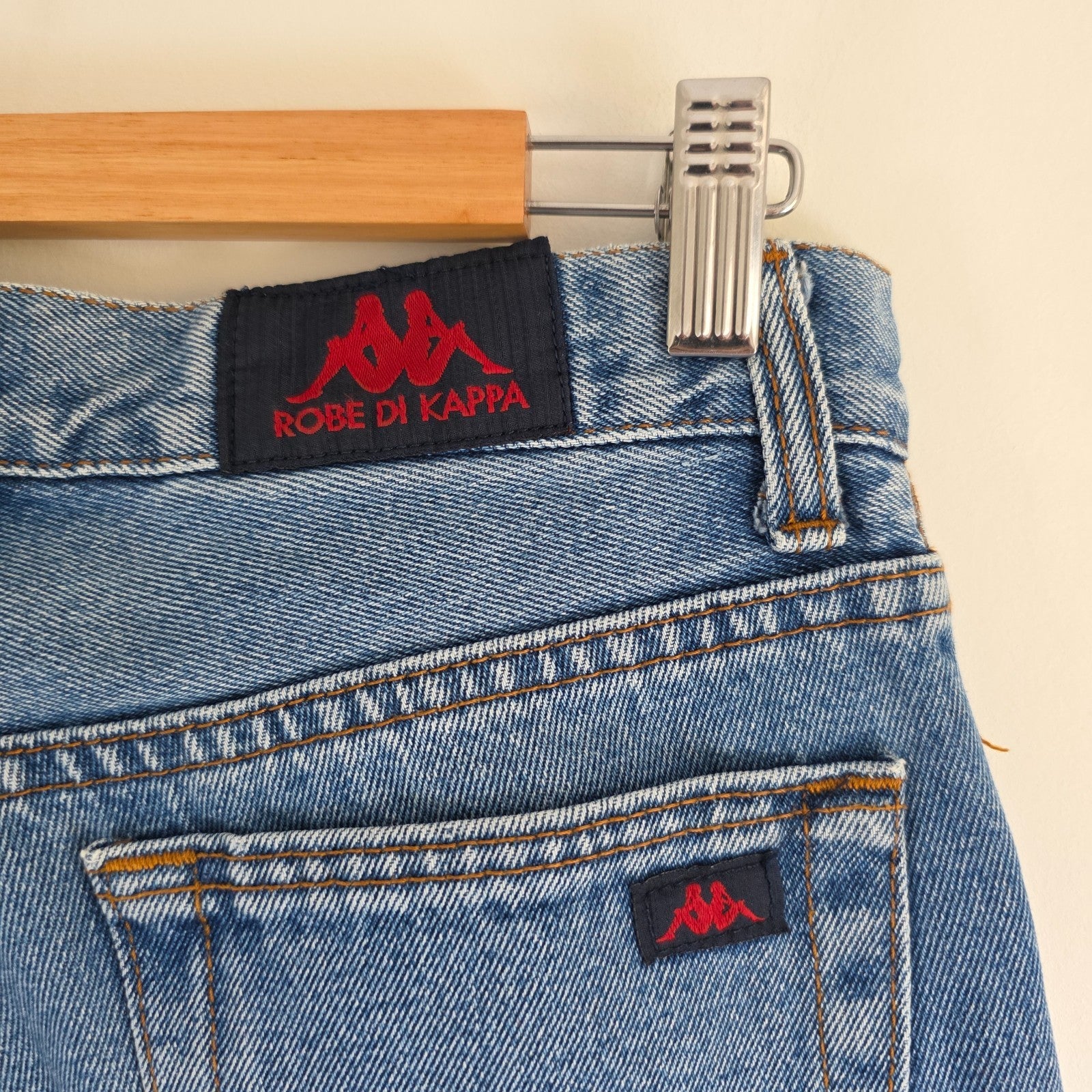Robe Di Kappa blue straight jeans with vintage wash and subtle logo detail.