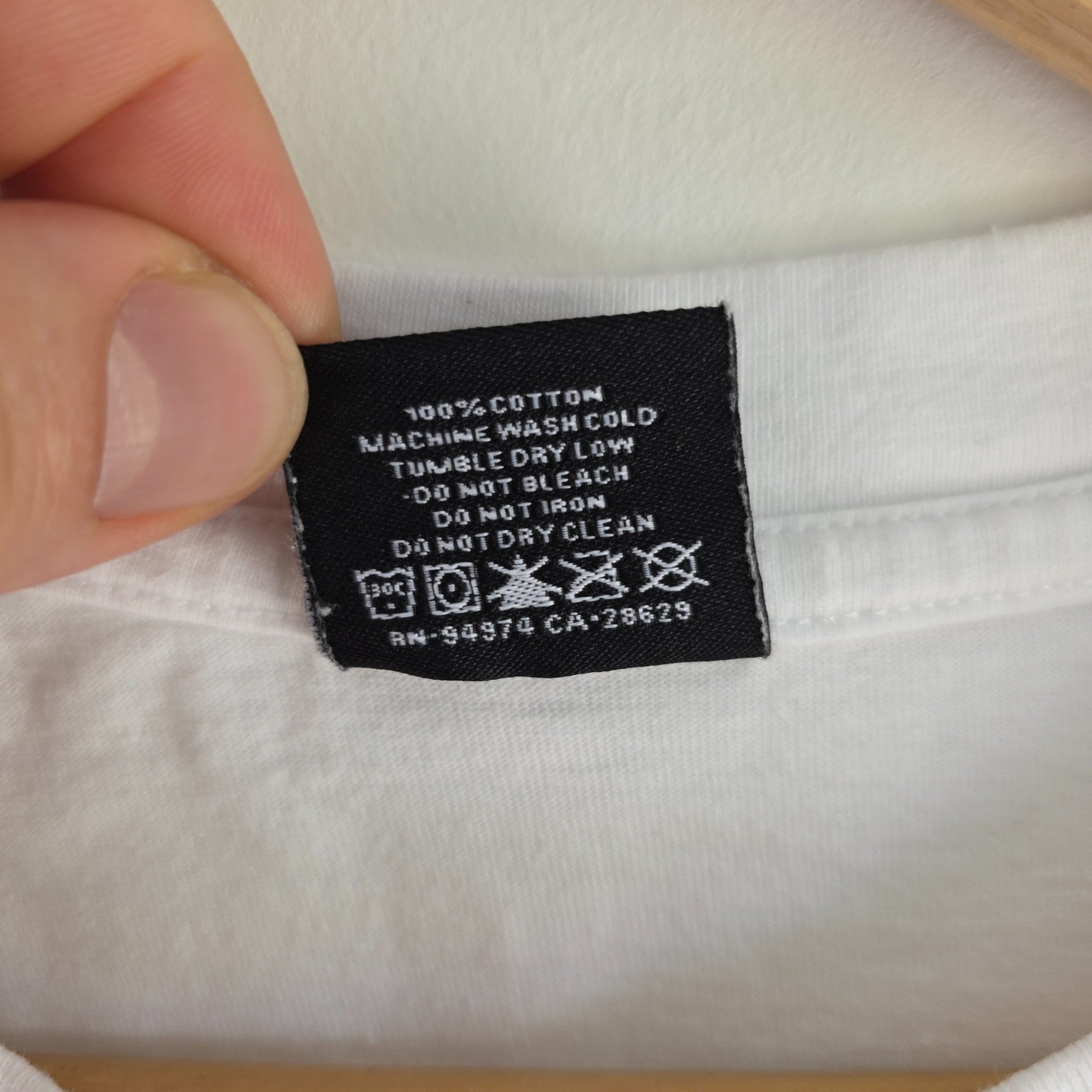 Stüssy x Nike white t-shirt with large 8 Ball back print and cotton material.