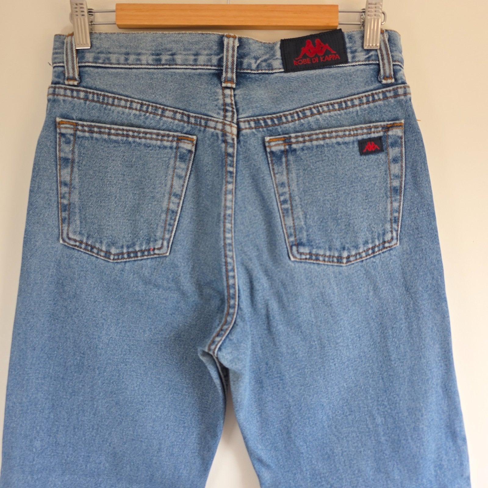 Robe Di Kappa blue straight jeans with vintage wash and subtle logo detail.