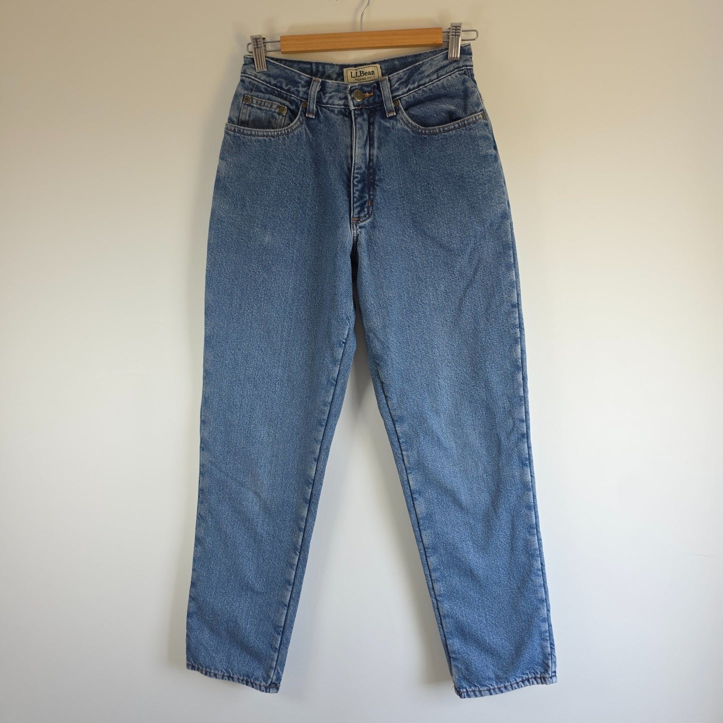 L.L.Bean blue straight jeans with fleece lining and relaxed high rise fit.