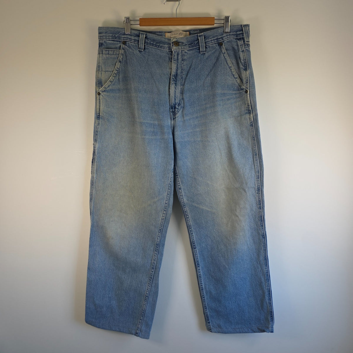 Urban Up blue carpenter jeans with hammer loop and utility pocket detailing.
