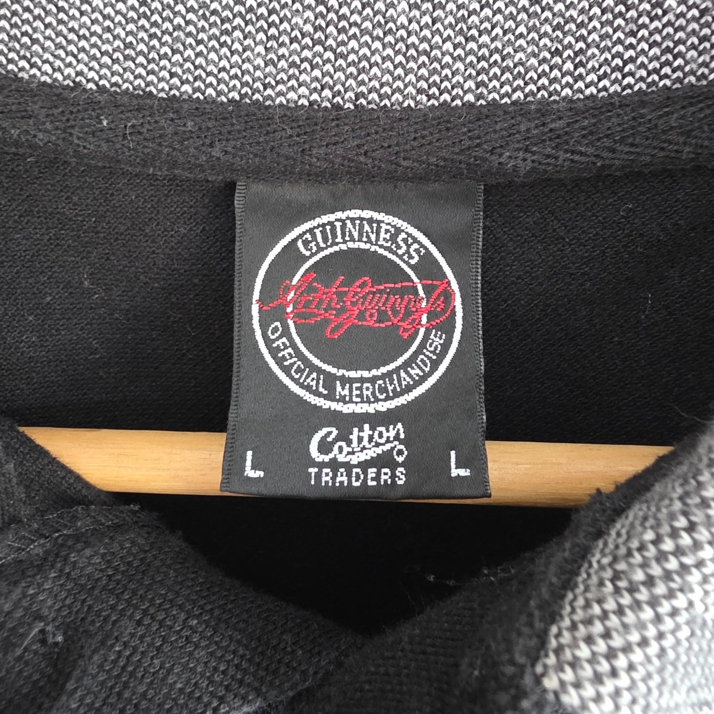 Guinness black polo shirt embroidered logo, 100% cotton, vintage style.