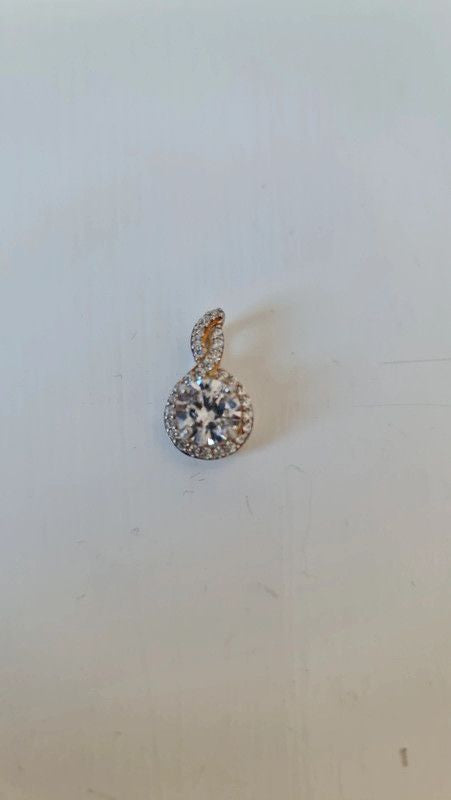 Silver Swirl Pendant with Clear Stones