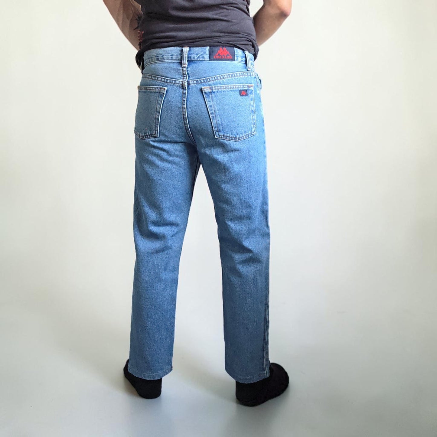 Robe Di Kappa blue straight jeans with vintage wash and subtle logo detail.