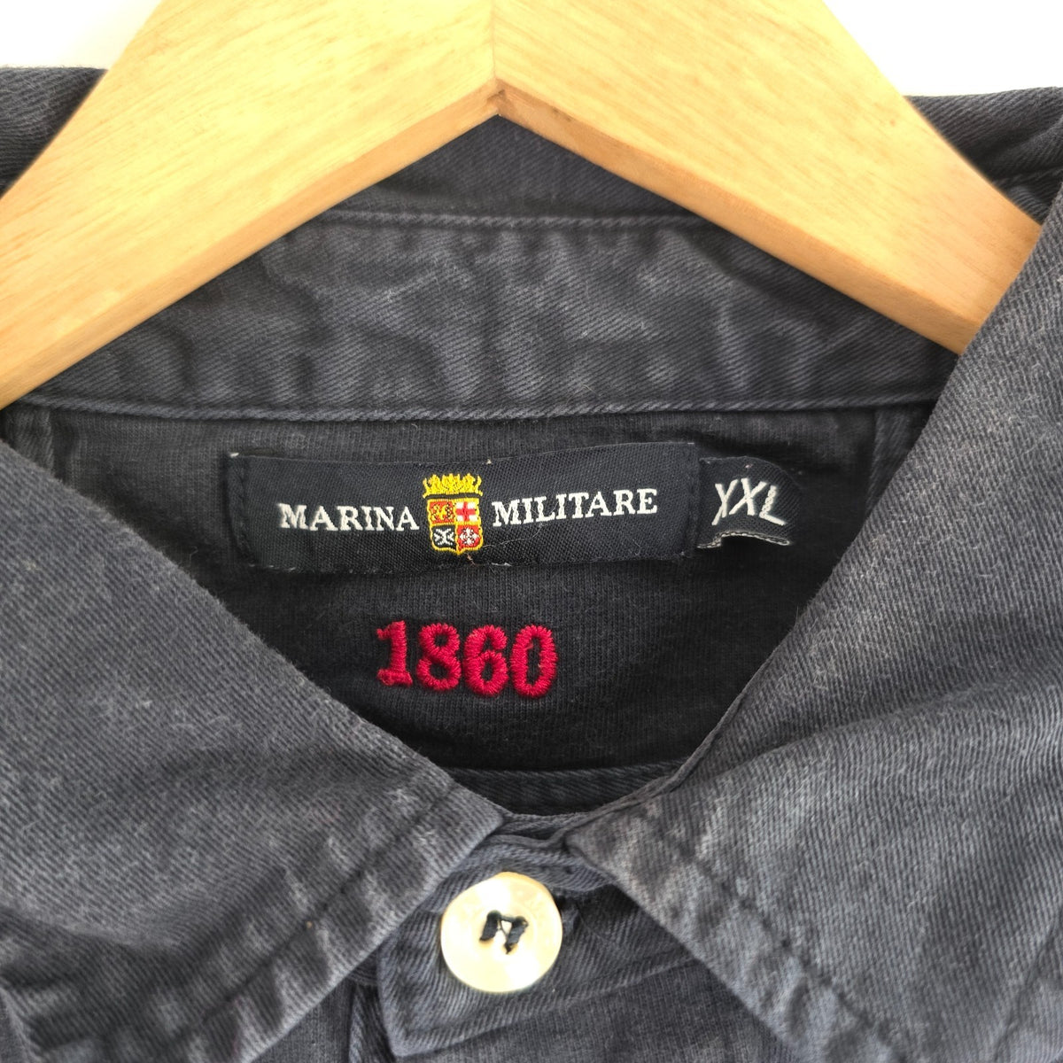 Marina Militare blue rugby shirt with embroidered crest and large nautical anchor appliqué.