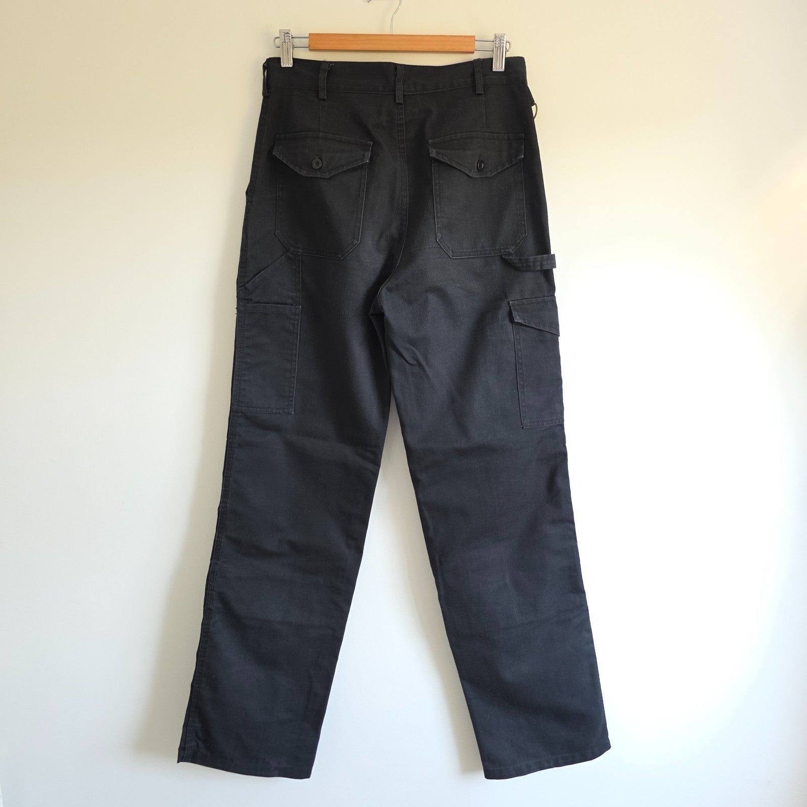 Dickies black cargo trousers with double knee panels and hammer loop detail.