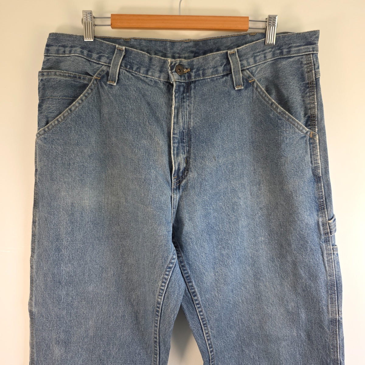 Faded Glory blue carpenter jeans with hammer loop and utility pockets, 100% cotton.