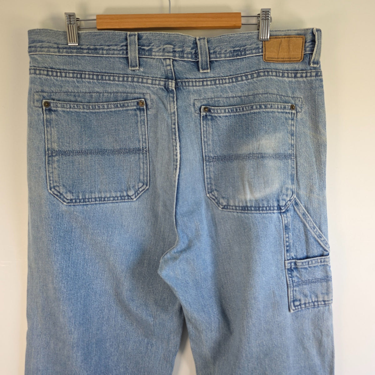 Urban Up blue carpenter jeans with hammer loop and utility pocket detailing.