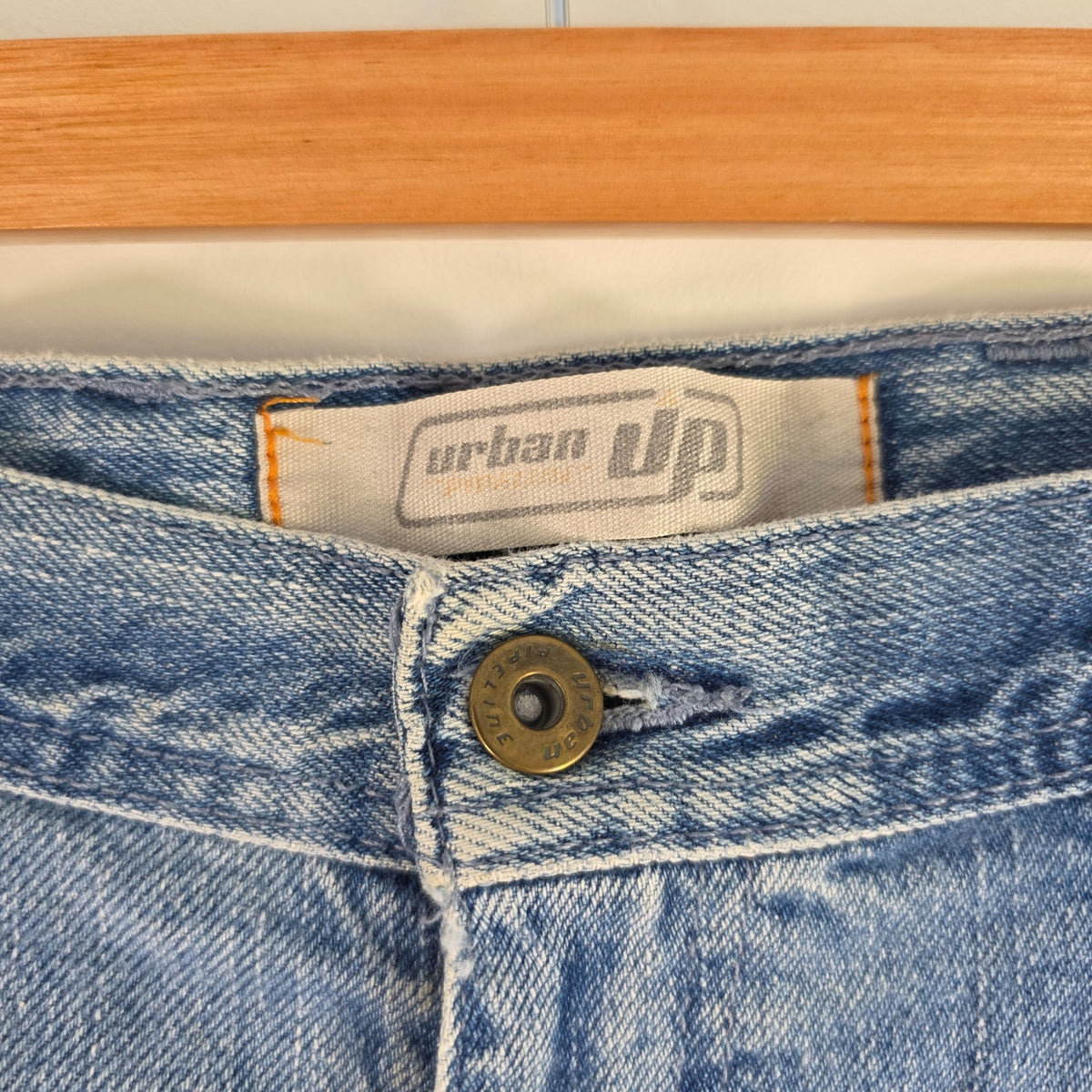 Urban Up blue carpenter jeans with hammer loop and utility pocket detailing.