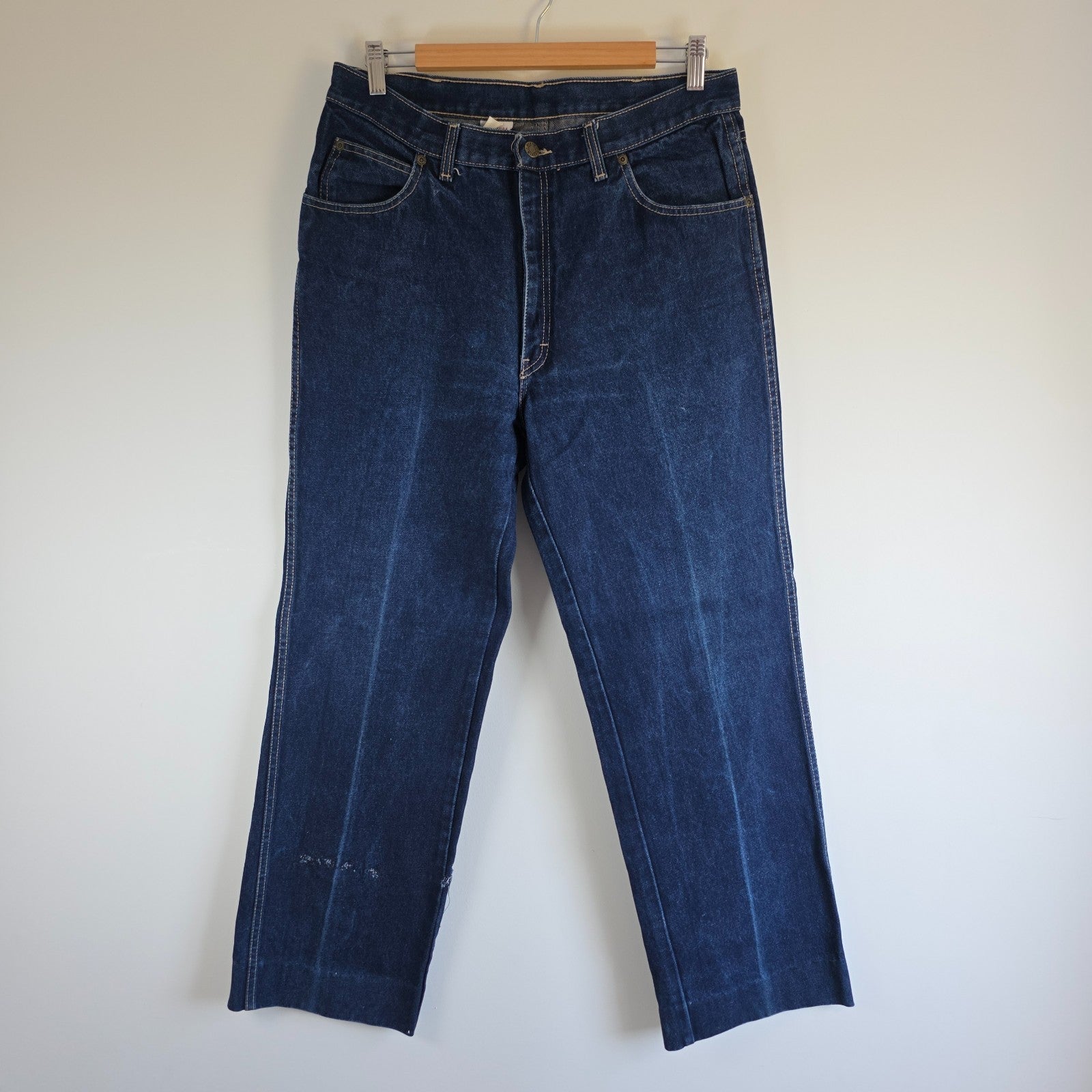 Calvin Klein blue straight leg jeans with vintage 90s style and cotton material.