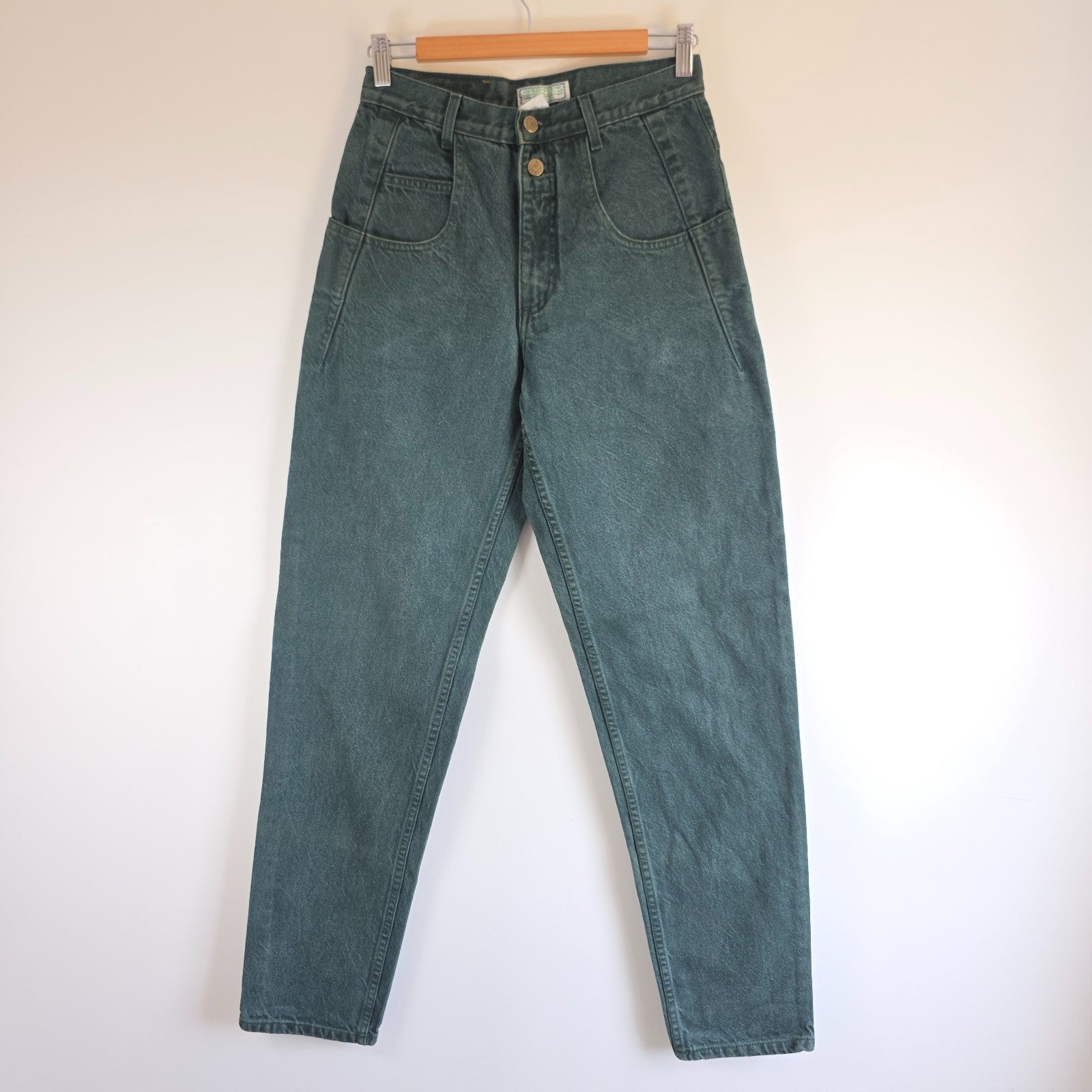 Levi's 501 white jeans distressed with natural wear, made in USA, classic fit.