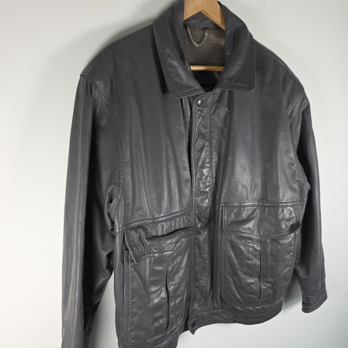 St Michael grey leather bomber jacket with utility pockets and elasticated waistband.