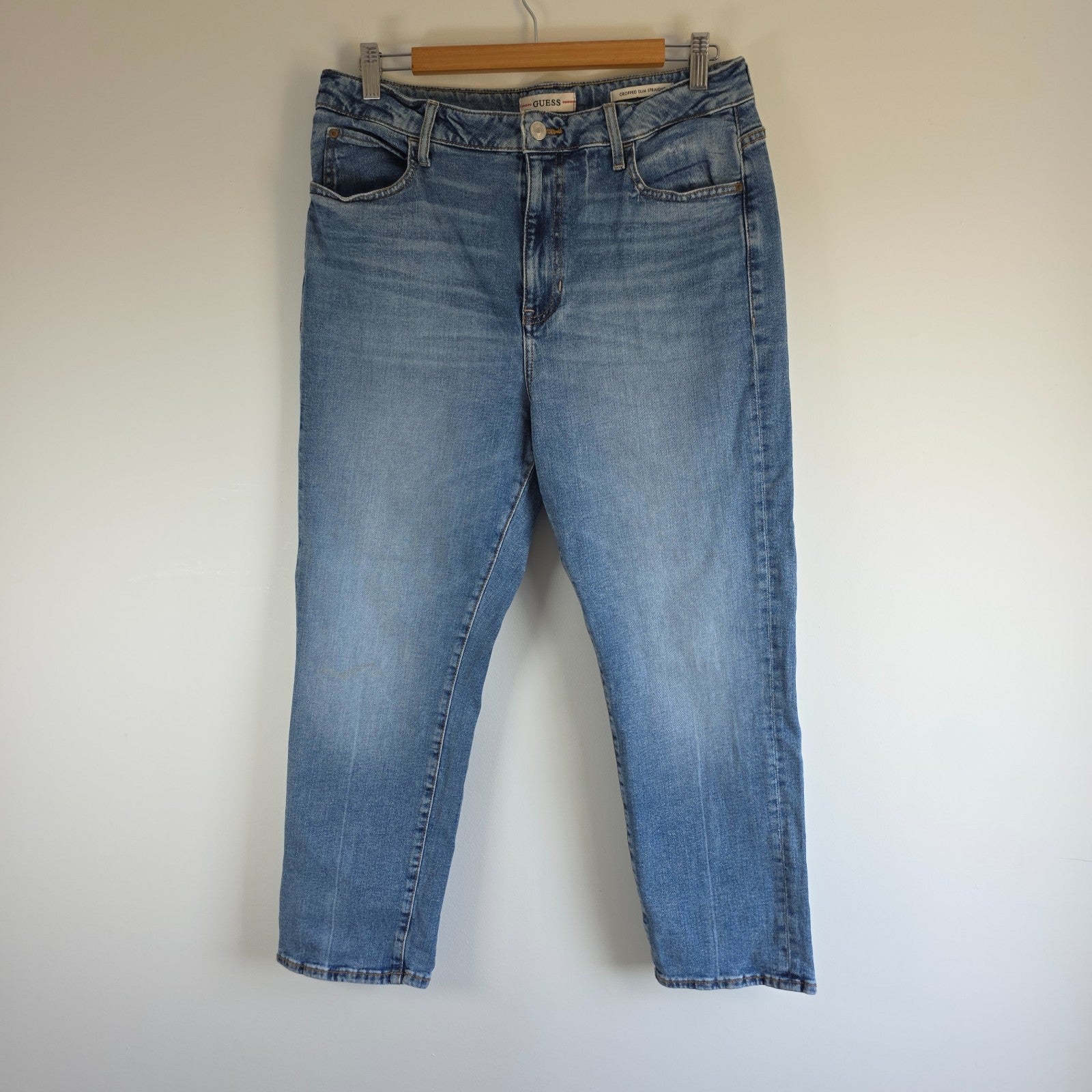 Vintage Guess blue cropped straight jeans with distressed details and high rise fit.